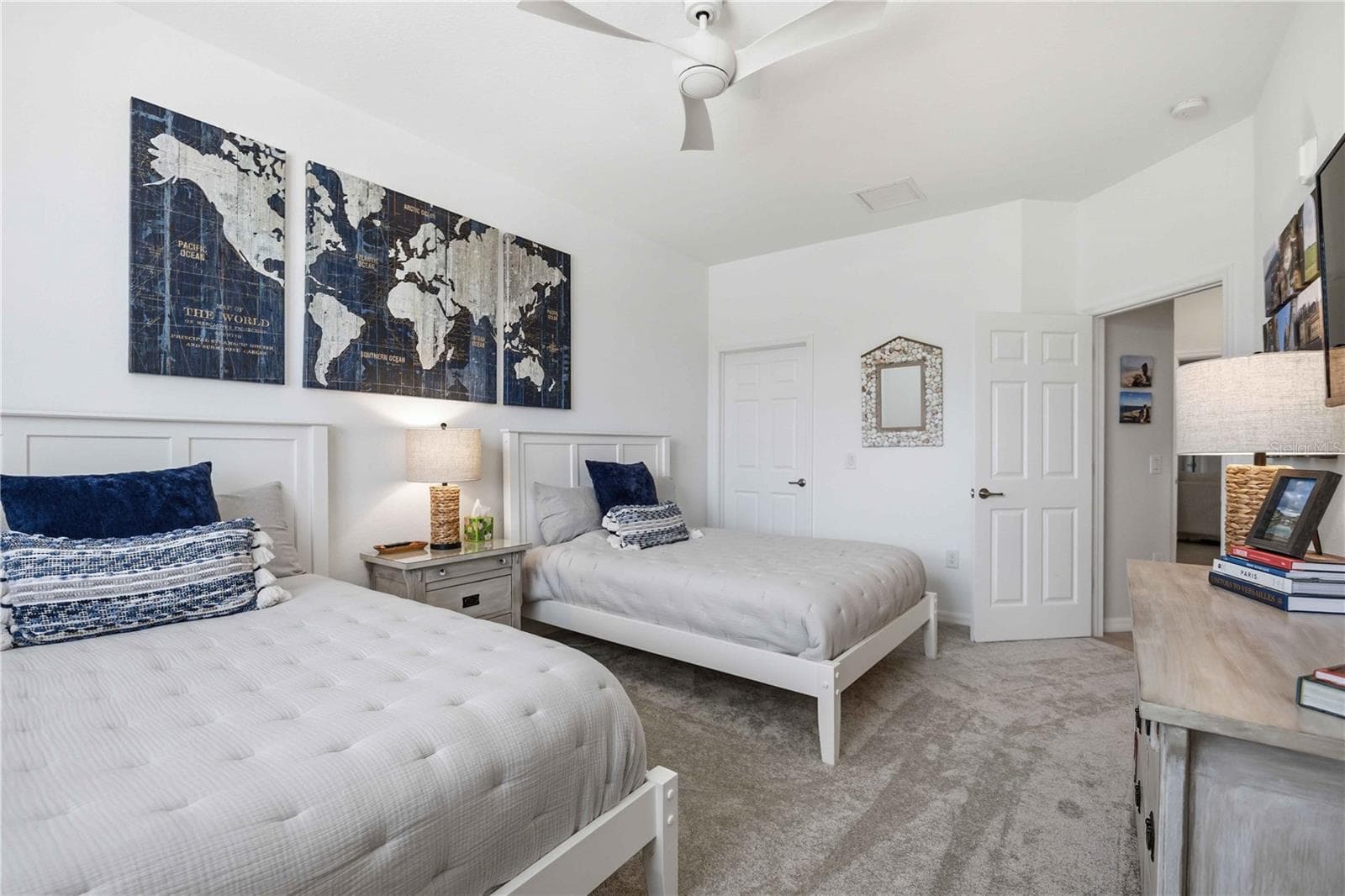 Guest room 3 has two full beds for guests. There is ample room to move around. - 10821 TARFLOWER DR #202, VENICE