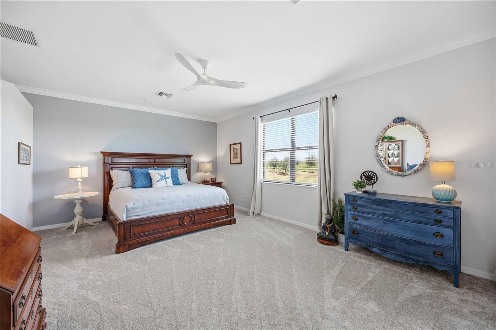 The primary bedroom is large and has a lot of space for almost anything. It is an ensuite bath for total privacy - 10821 TARFLOWER DR #202, VENICE
