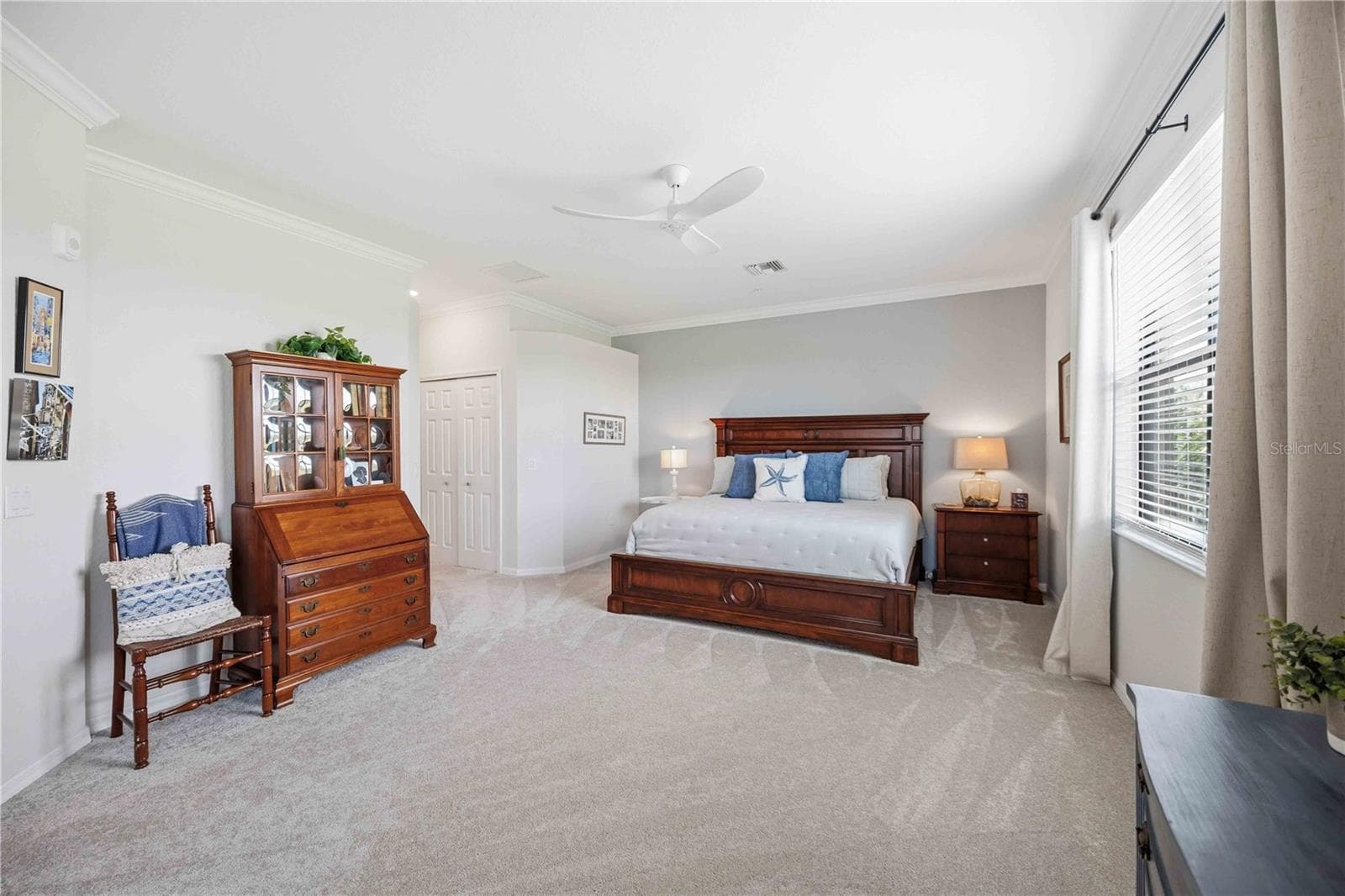 The primary bedroom is large and has a lot of space for almost anything. It is an ensuite bath for total privacy - 10821 TARFLOWER DR #202, VENICE
