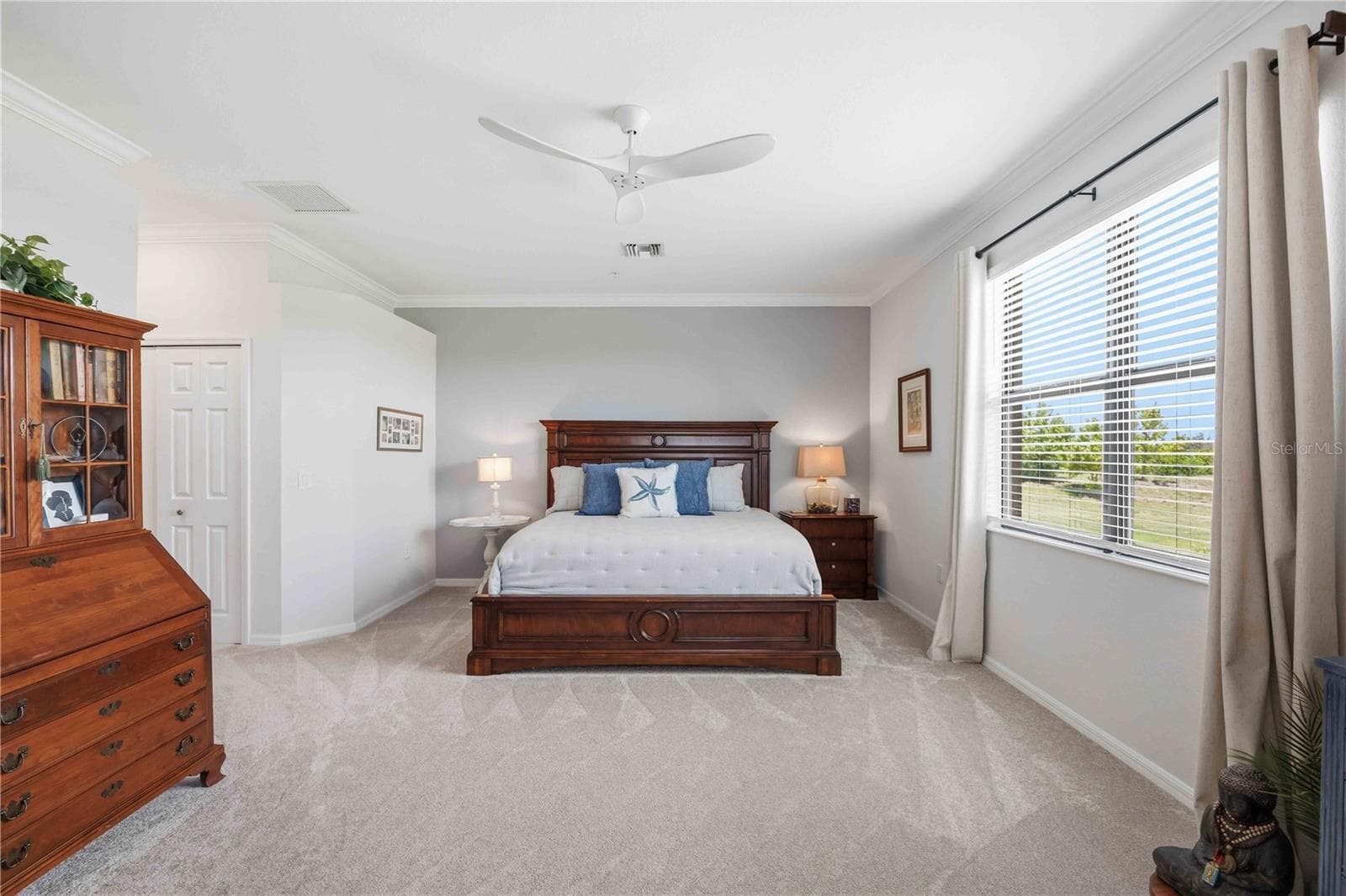 The primary bedroom is large and has a lot of space for almost anything. It is an ensuite bath for total privacy - 10821 TARFLOWER DR #202, VENICE