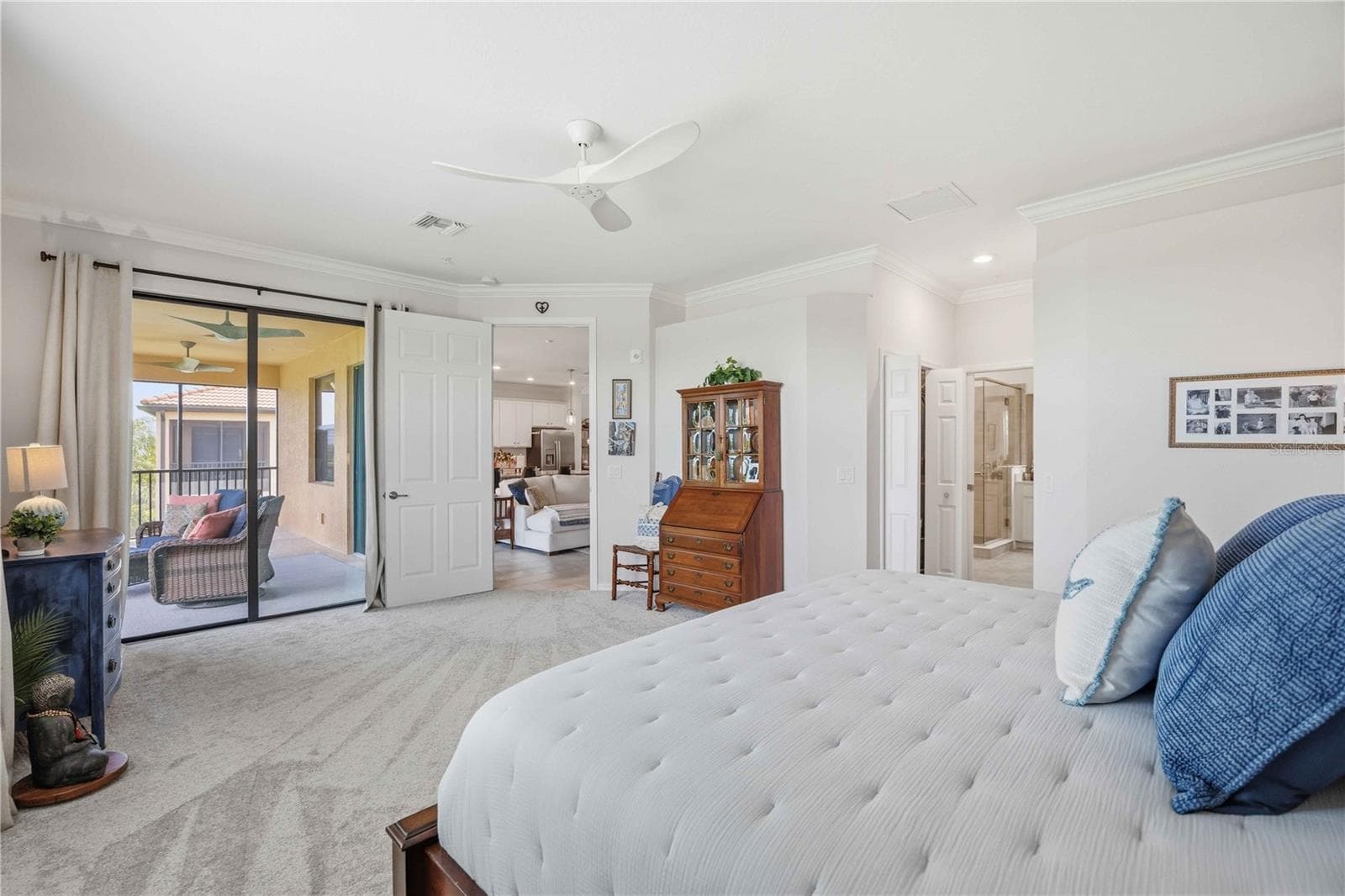 The primary bedroom is large and has a lot of space for almost anything. It is an ensuite bath for total privacy - 10821 TARFLOWER DR #202, VENICE