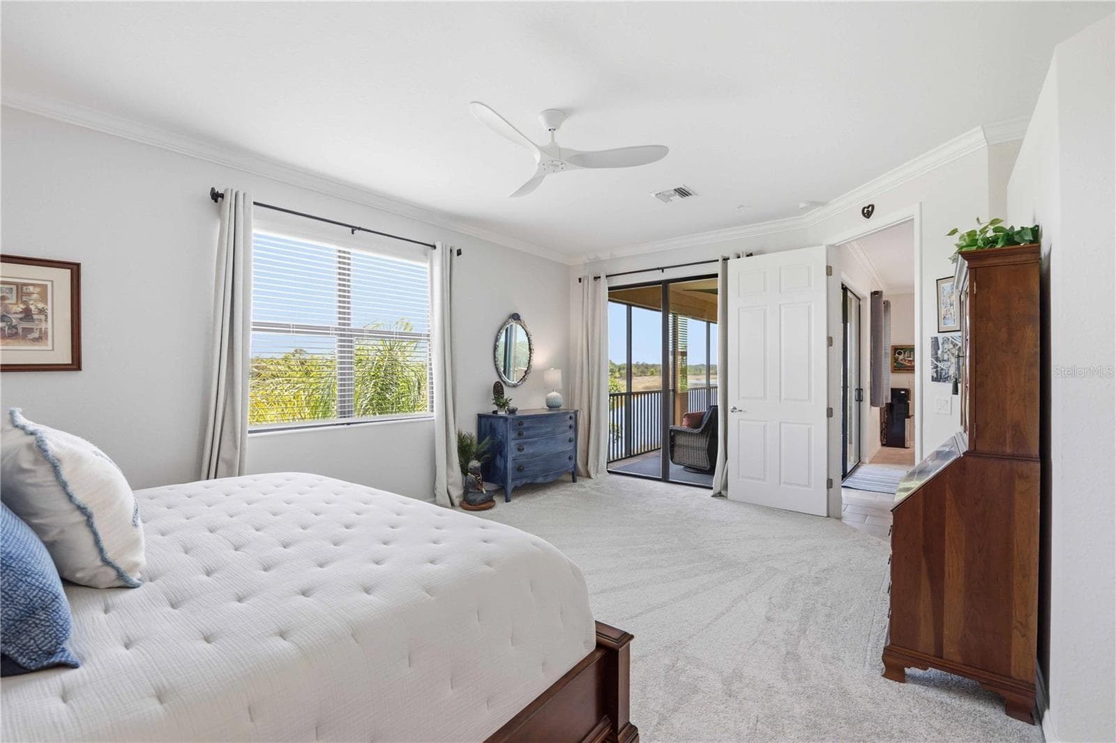 The primary bedroom is large and has a lot of space for almost anything. It is an ensuite bath for total privacy - 10821 TARFLOWER DR #202, VENICE