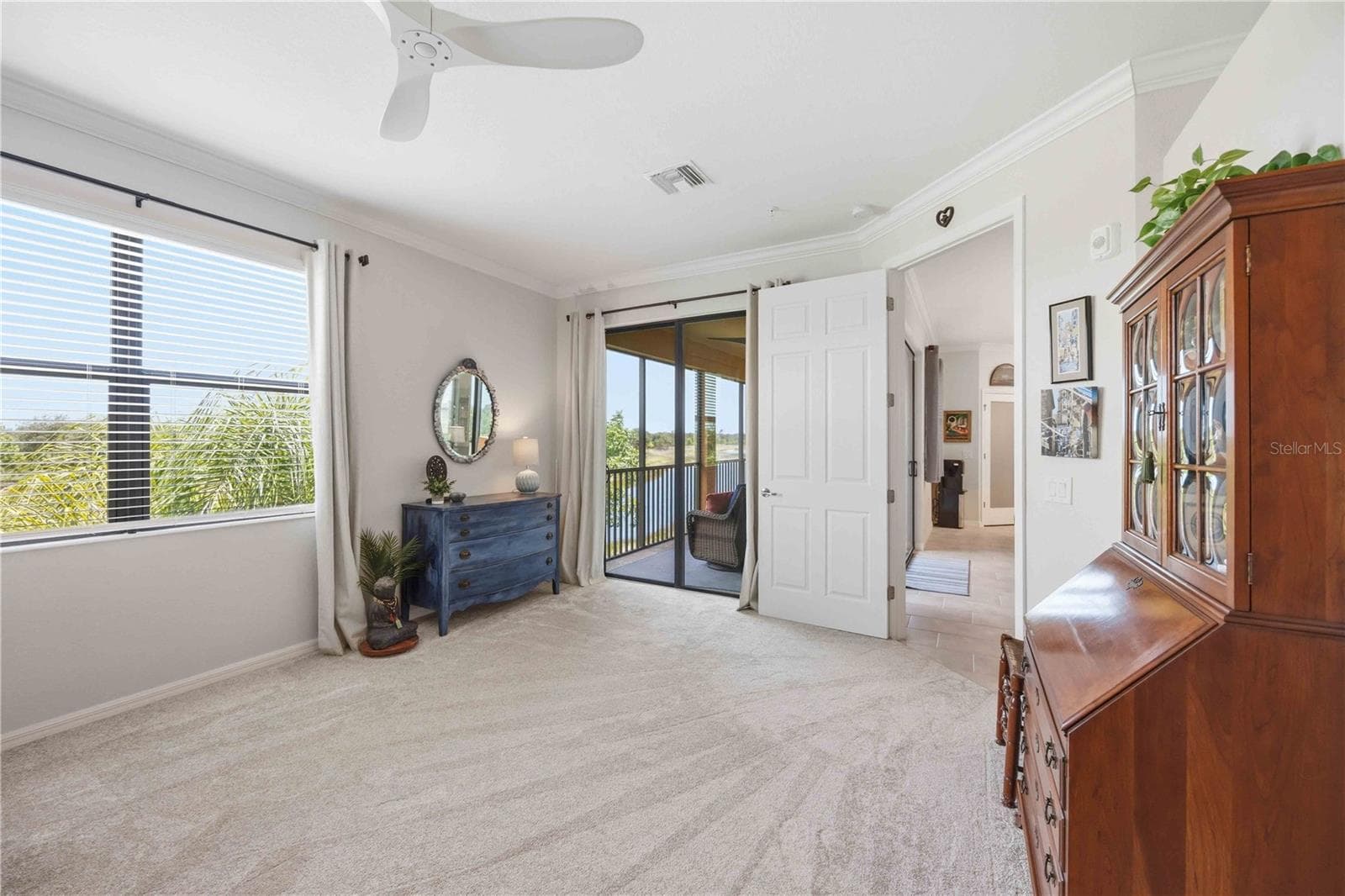 The primary bedroom is large and has a lot of space for almost anything. It is an ensuite bath for total privacy - 10821 TARFLOWER DR #202, VENICE
