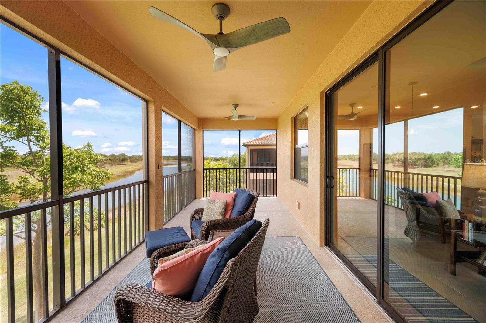The 12x20' lanai is fabulous to just sit and enjoy the day or evening. - 10821 TARFLOWER DR #202, VENICE