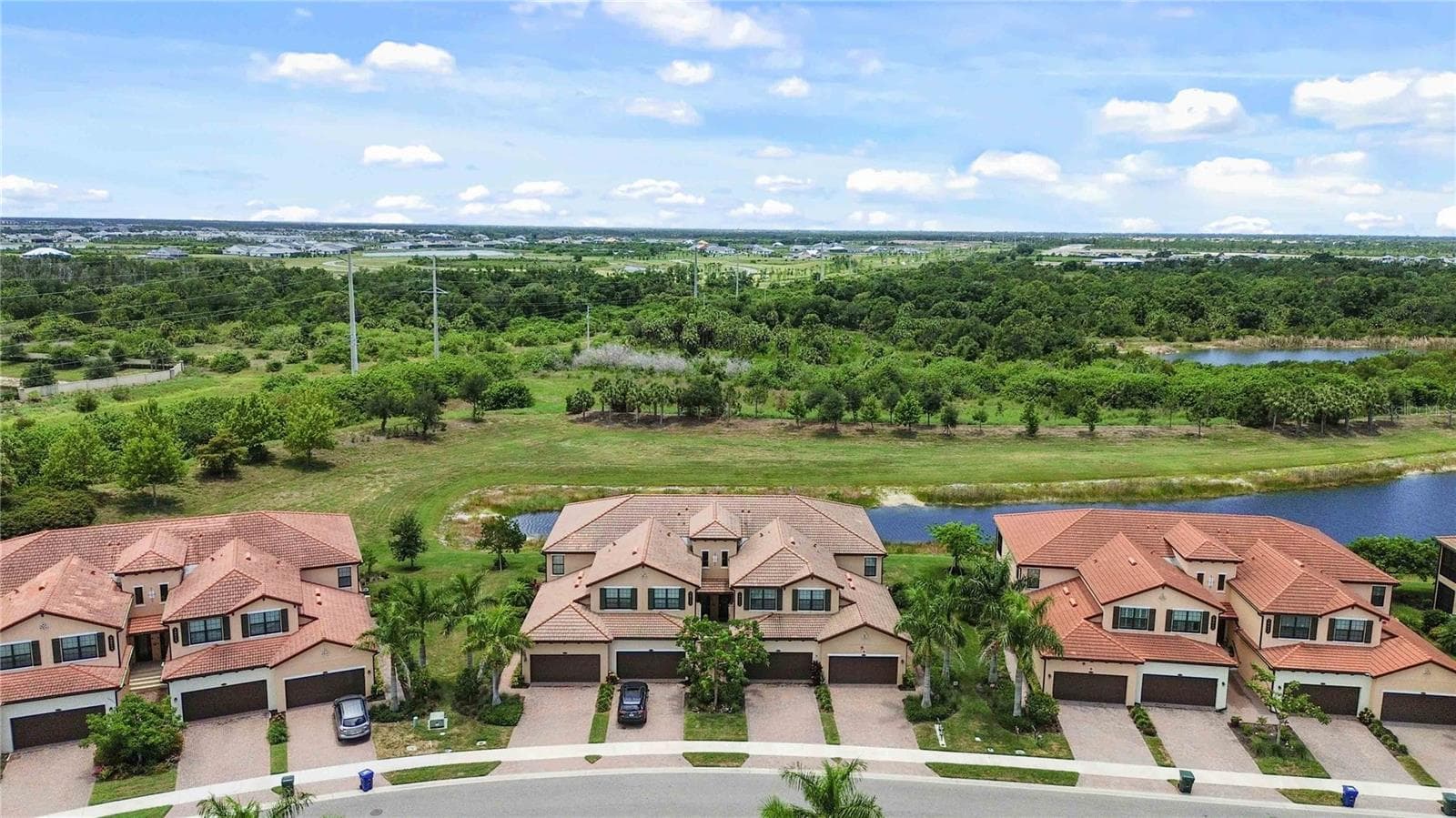 Aerial of the condo from the front of the building. - 10821 TARFLOWER DR #202, VENICE