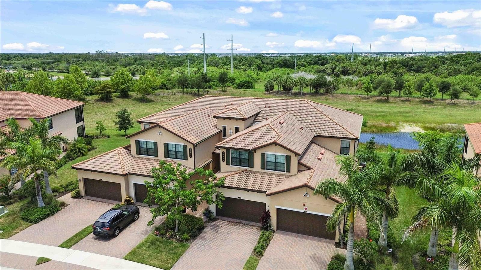 Aerial of the condo from the front of the building. - 10821 TARFLOWER DR #202, VENICE