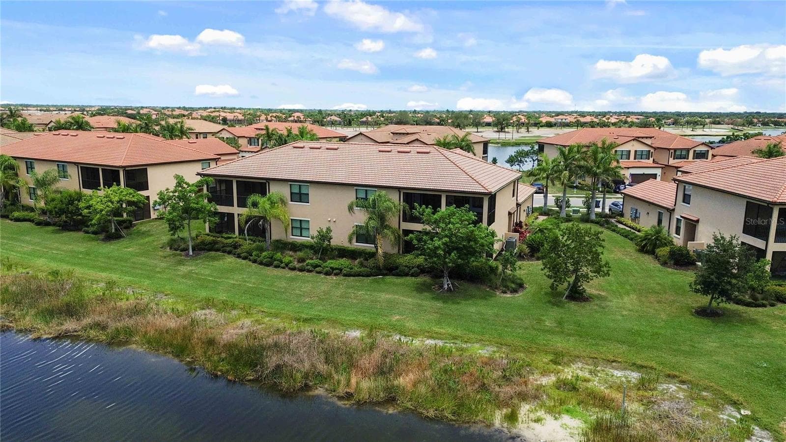 The water view from the lanai - 10821 TARFLOWER DR #202, VENICE