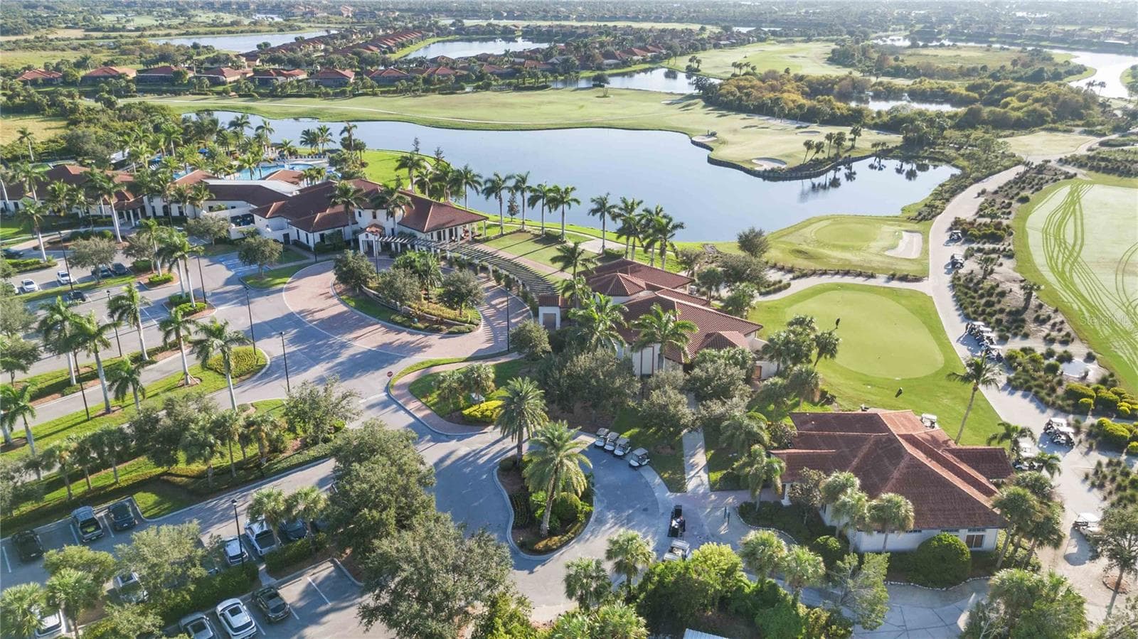 The golf course from the air - 10821 TARFLOWER DR #202, VENICE