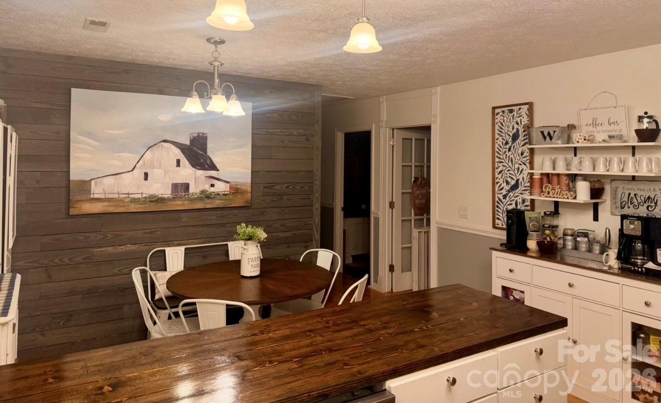 Single Family Residence at 1702 Cajah Mountain Road, Hudson, photo 7 of 35