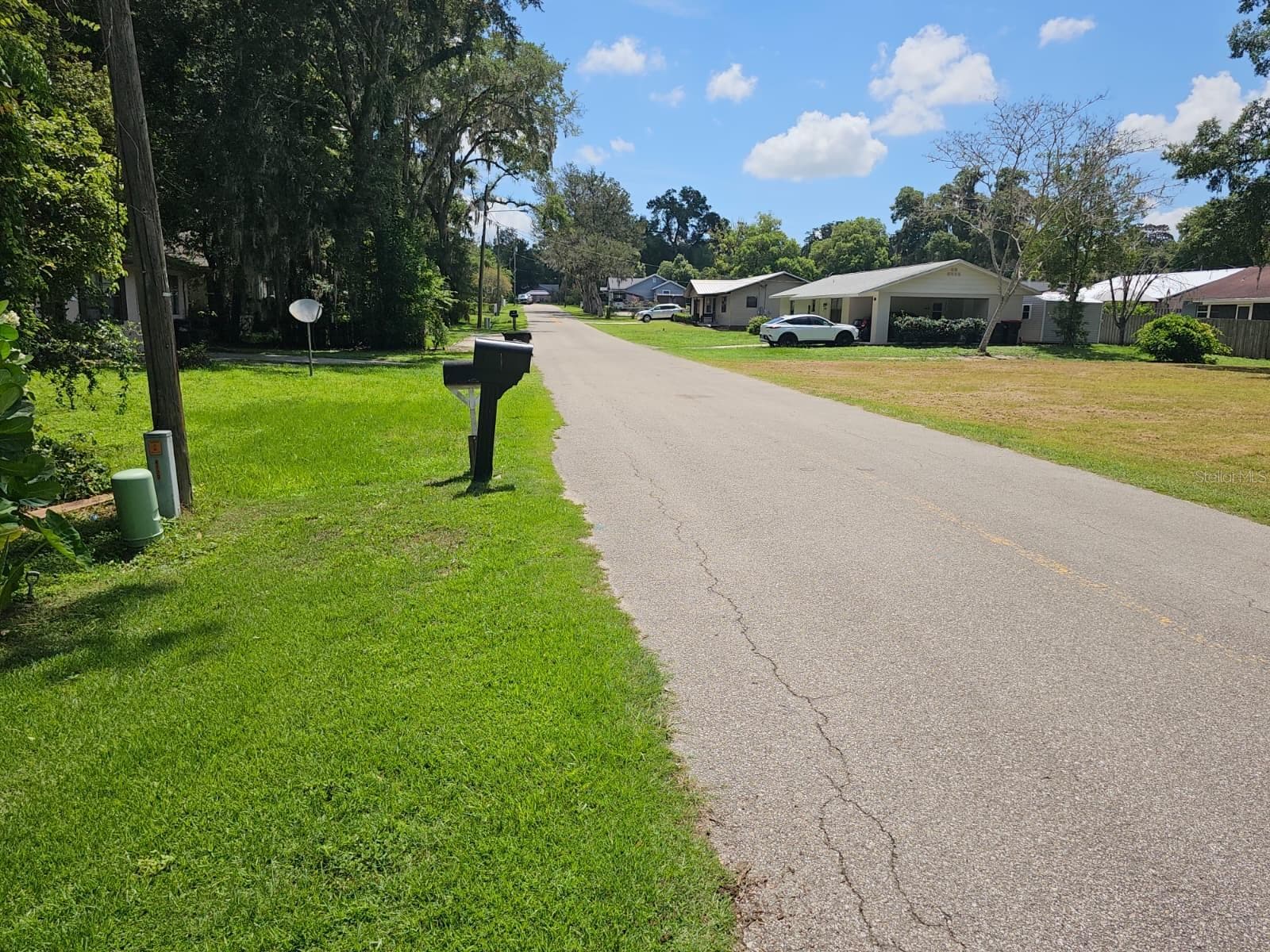 street view in front of house looking down 114th st. - 5203 SE 114TH ST, BELLEVIEW