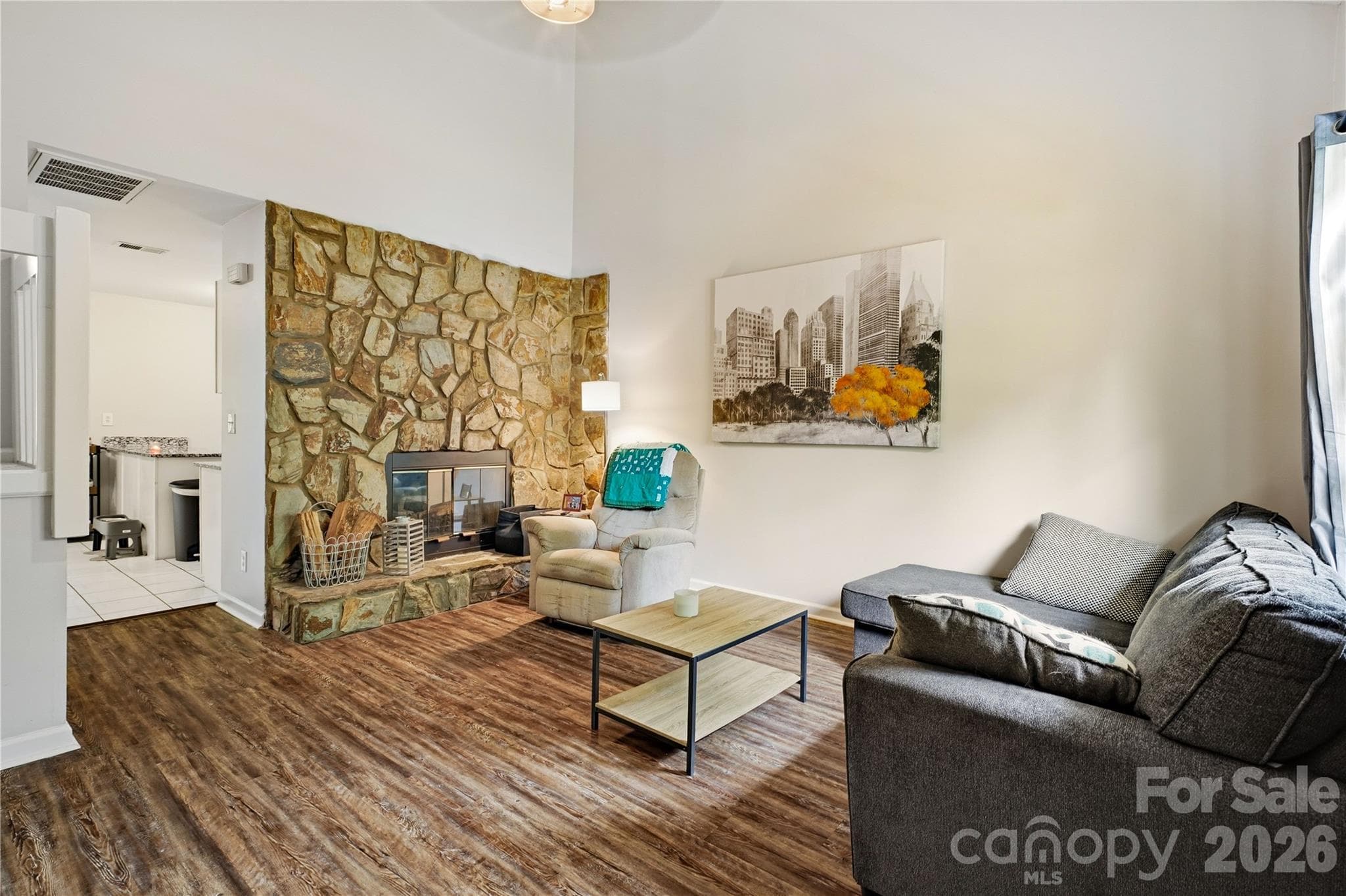 Beautiful stone fireplace and vaulted ceiling - 6355 Windsor Gate Lane, Charlotte