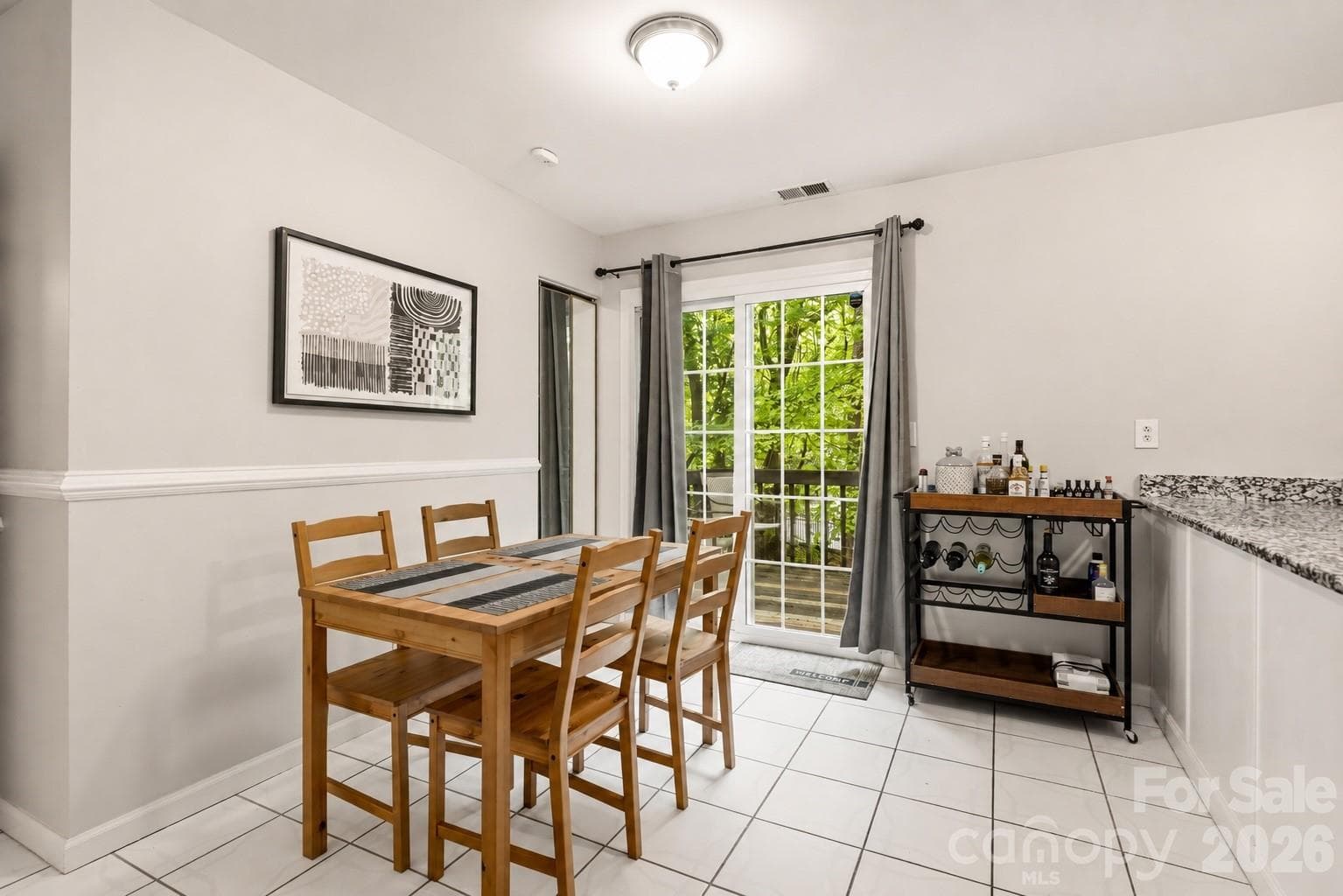 Spacious eating area - sliders lead to back deck - 6355 Windsor Gate Lane, Charlotte