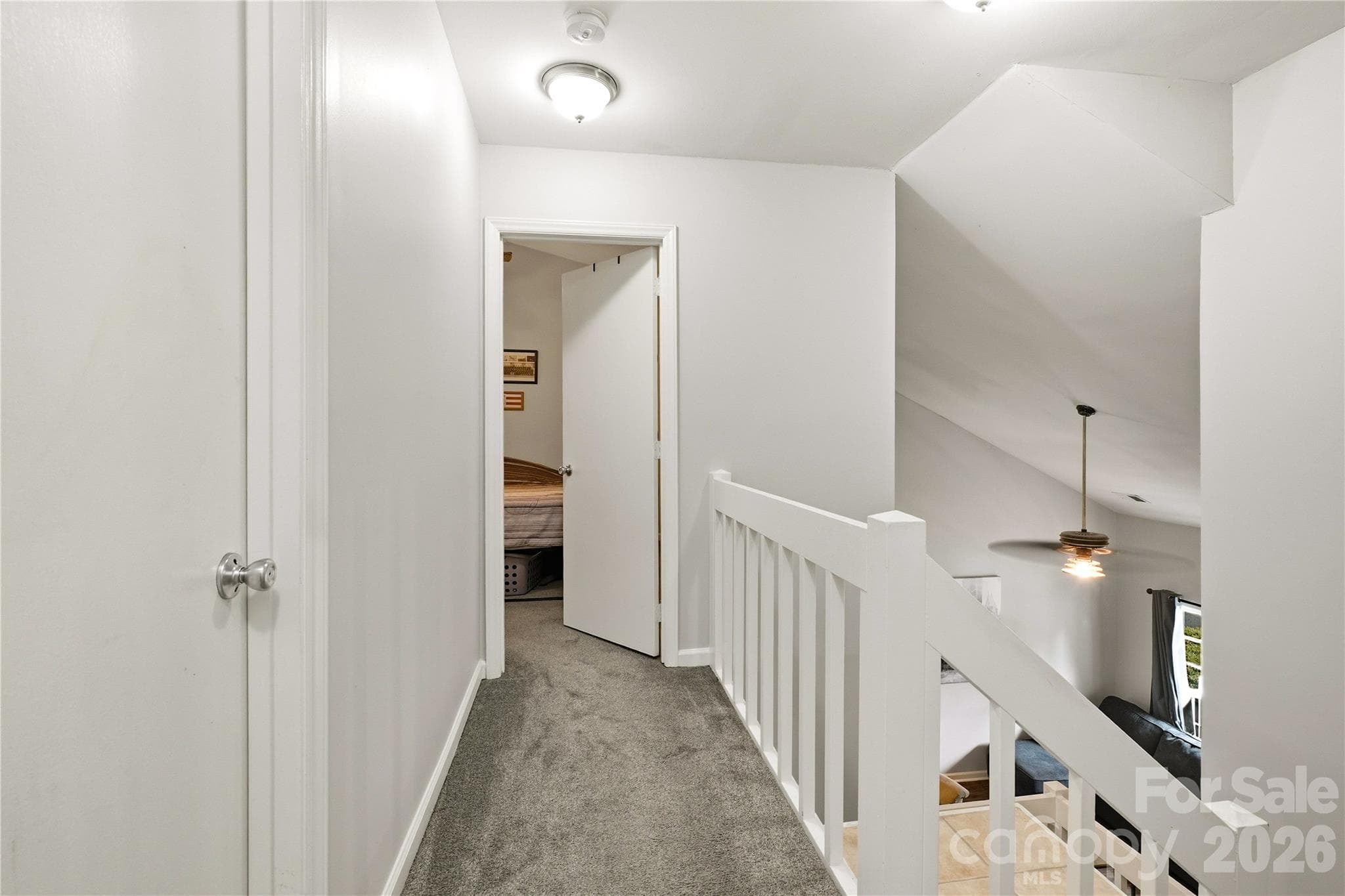 Hallway leading to additional bedrooms - 6355 Windsor Gate Lane, Charlotte