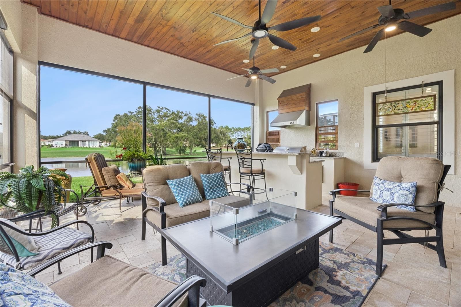 Stunning Summer Kitchen designed for the best outdoor Barbecue experience. - 9219 SAN JOSE BLVD, HOWEY IN THE HILLS