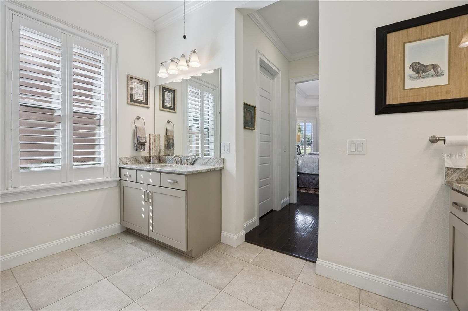 Master bath with plantation shutters. - 9219 SAN JOSE BLVD, HOWEY IN THE HILLS