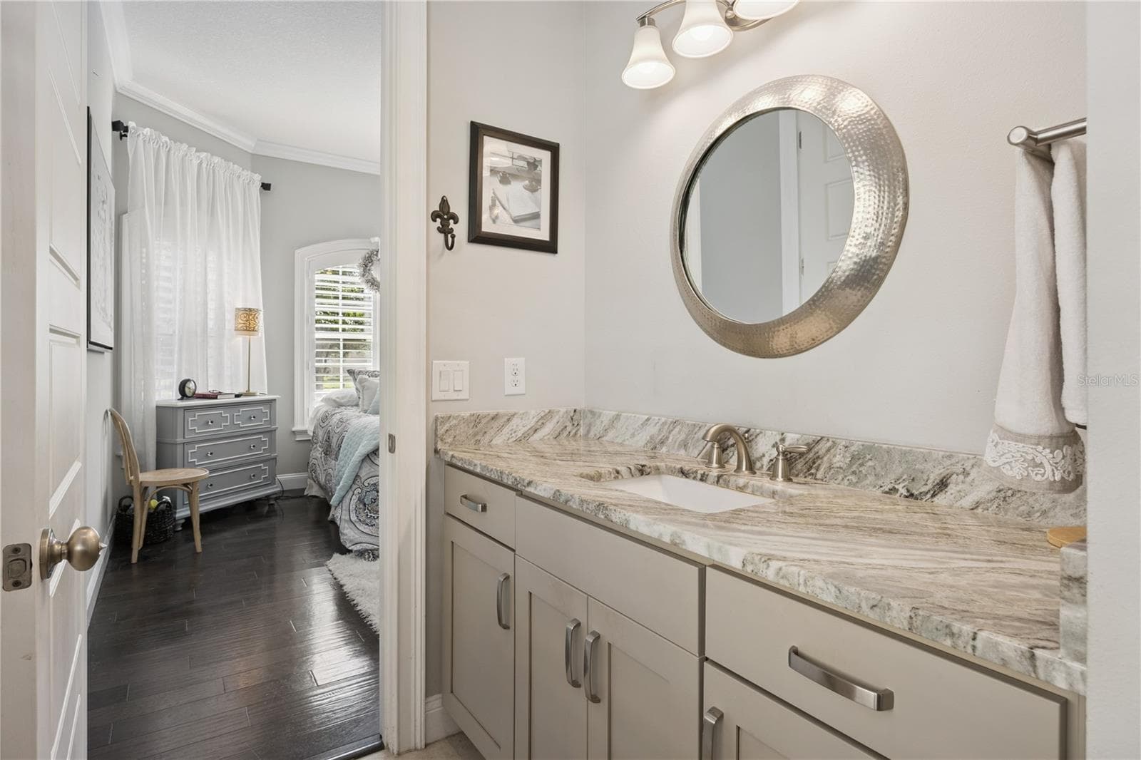 Guest Bath granite vanity. - 9219 SAN JOSE BLVD, HOWEY IN THE HILLS