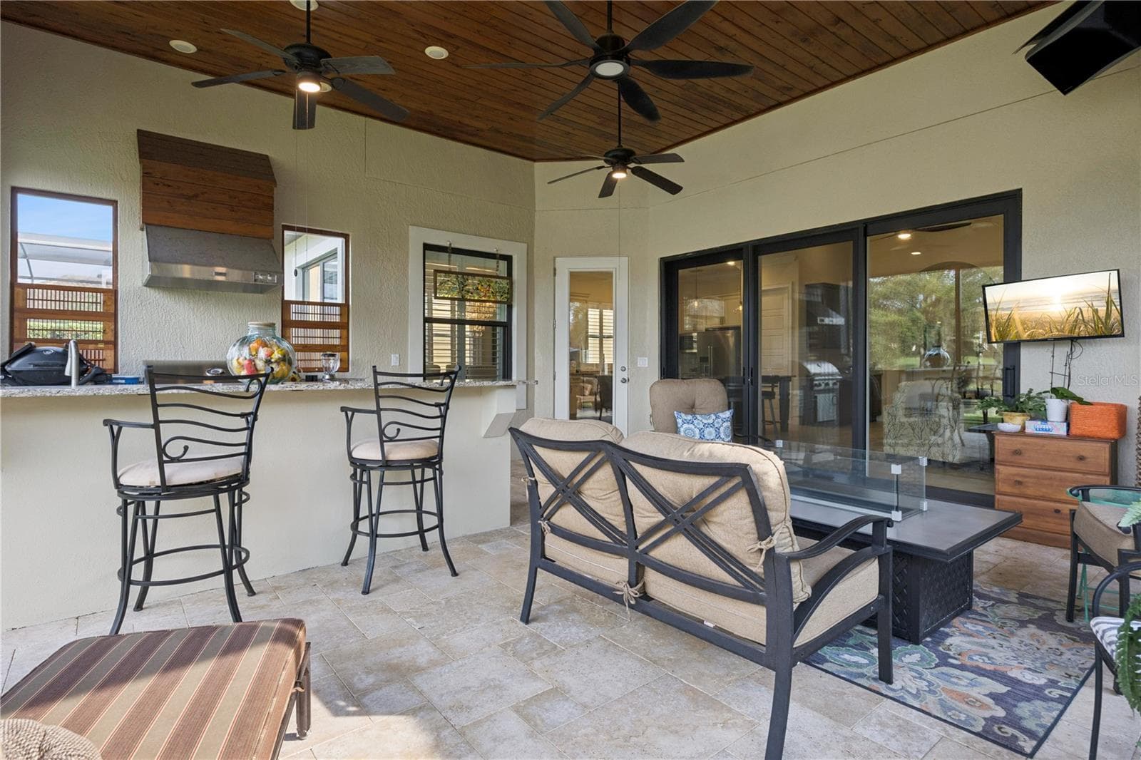 Inviting Summer Kitchen with gas grill. - 9219 SAN JOSE BLVD, HOWEY IN THE HILLS