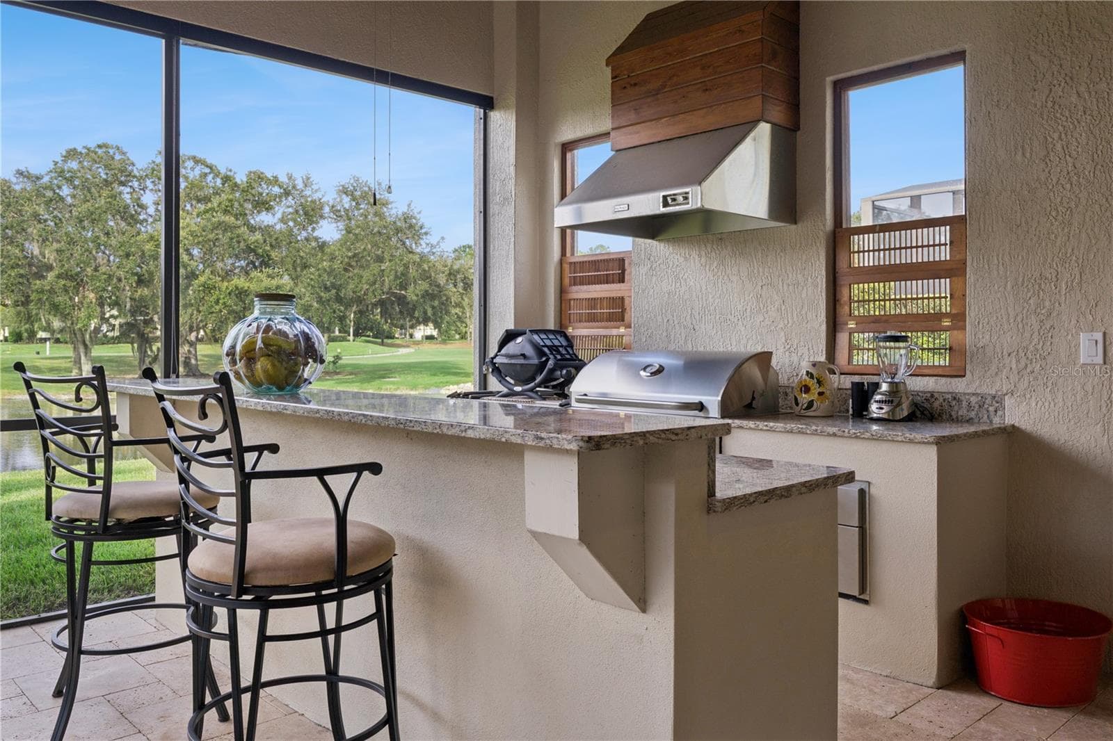 Lovely outdoor entertainment Summer Kitchen. - 9219 SAN JOSE BLVD, HOWEY IN THE HILLS