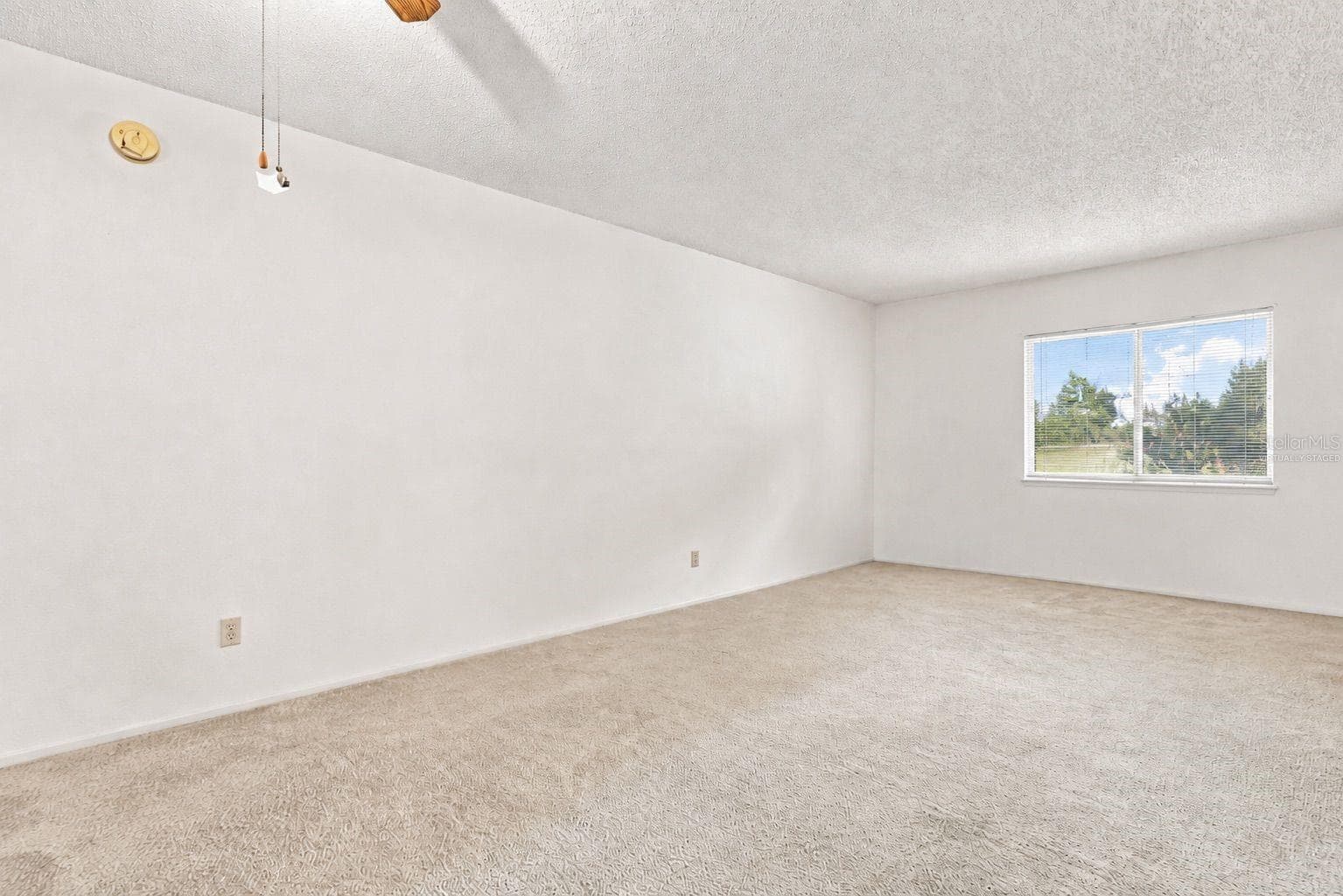 Virtually staged living room - 1418 CATALINA BLVD, DELTONA