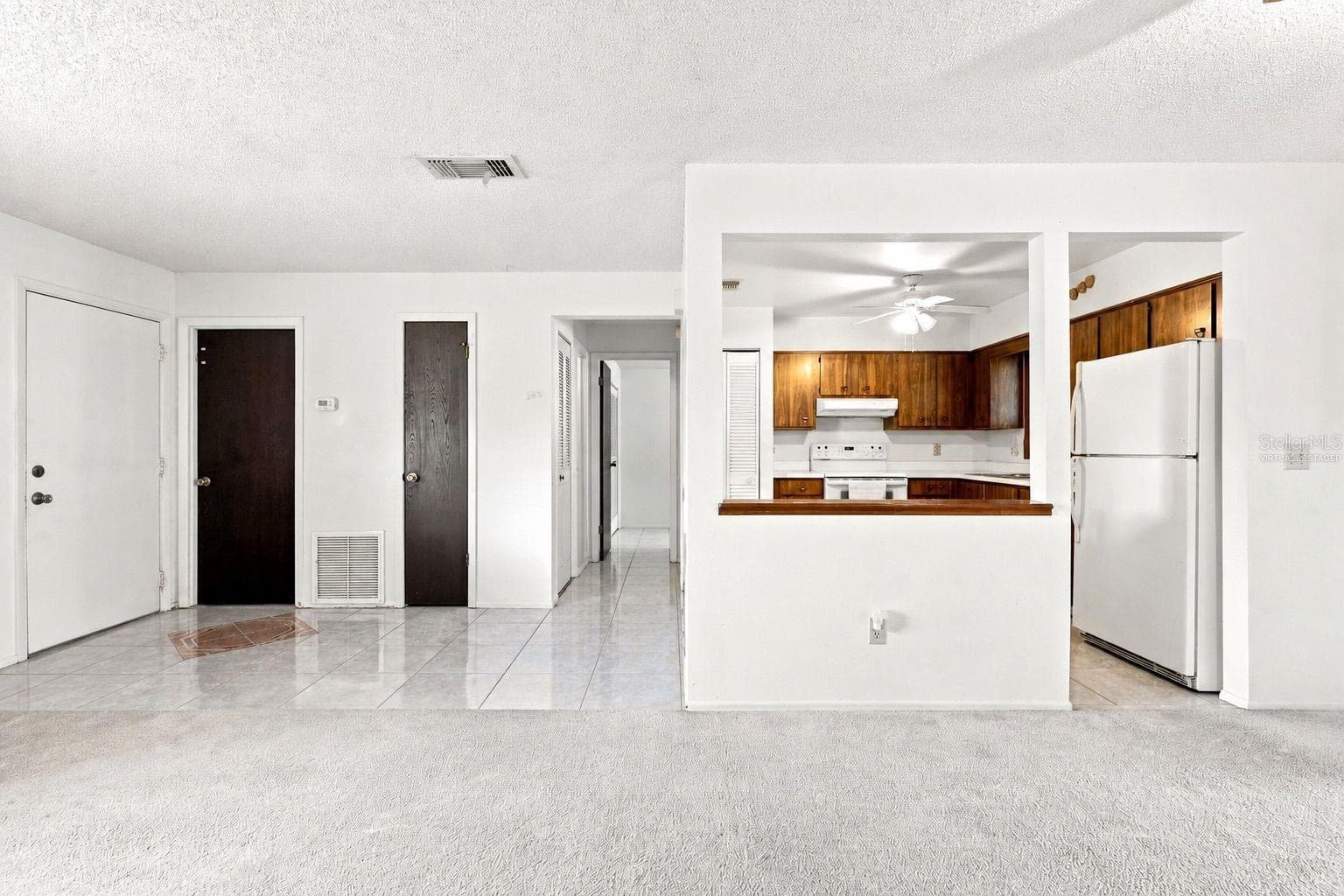 Virtually staged dining area - 1418 CATALINA BLVD, DELTONA
