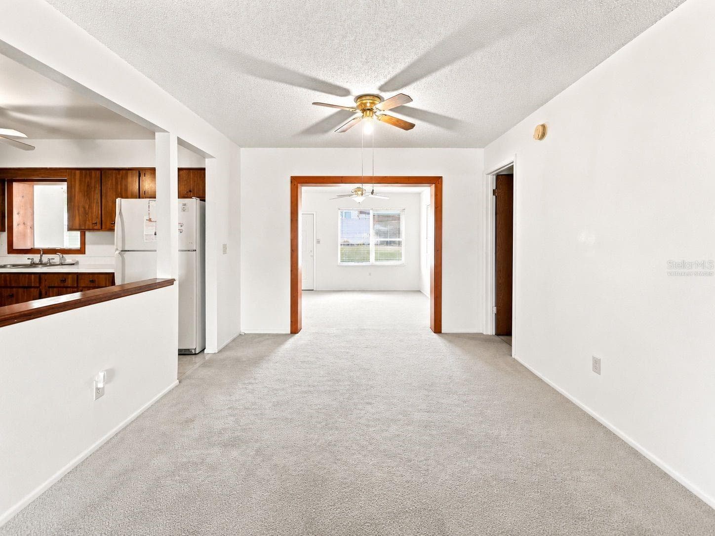 Virtually staged dining room - 1418 CATALINA BLVD, DELTONA