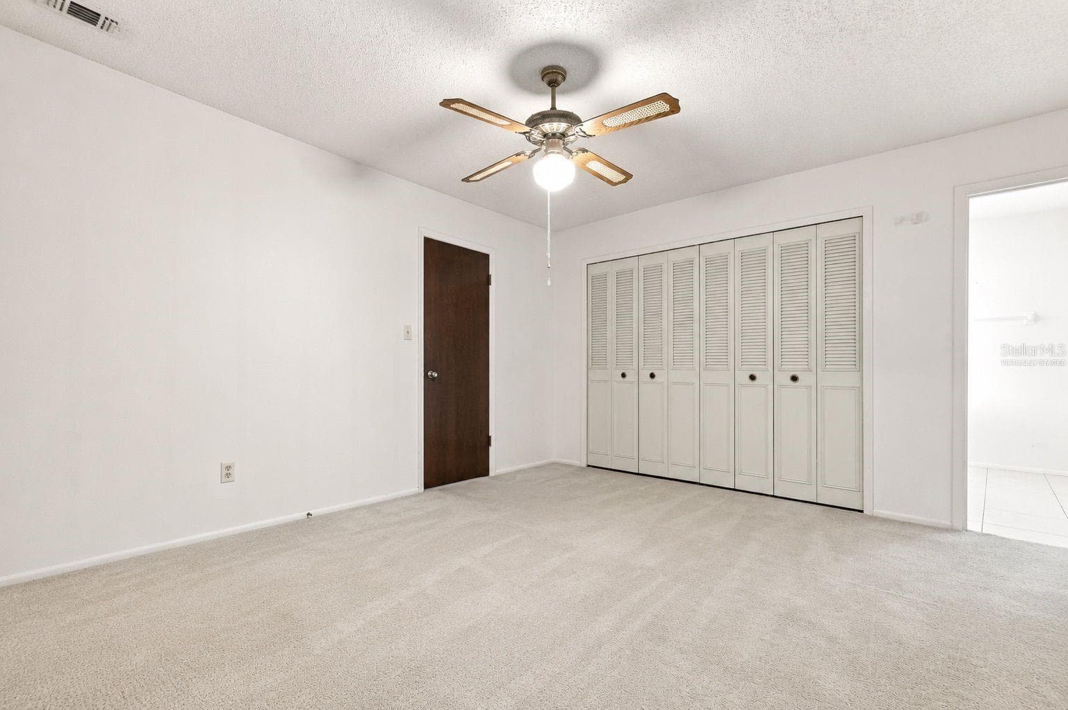 Virtually staged Master bedroom - 1418 CATALINA BLVD, DELTONA
