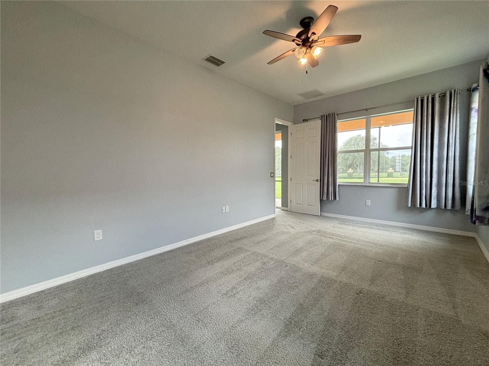 Primary Suite - 1124 SAWGRASS DR, WINTER HAVEN