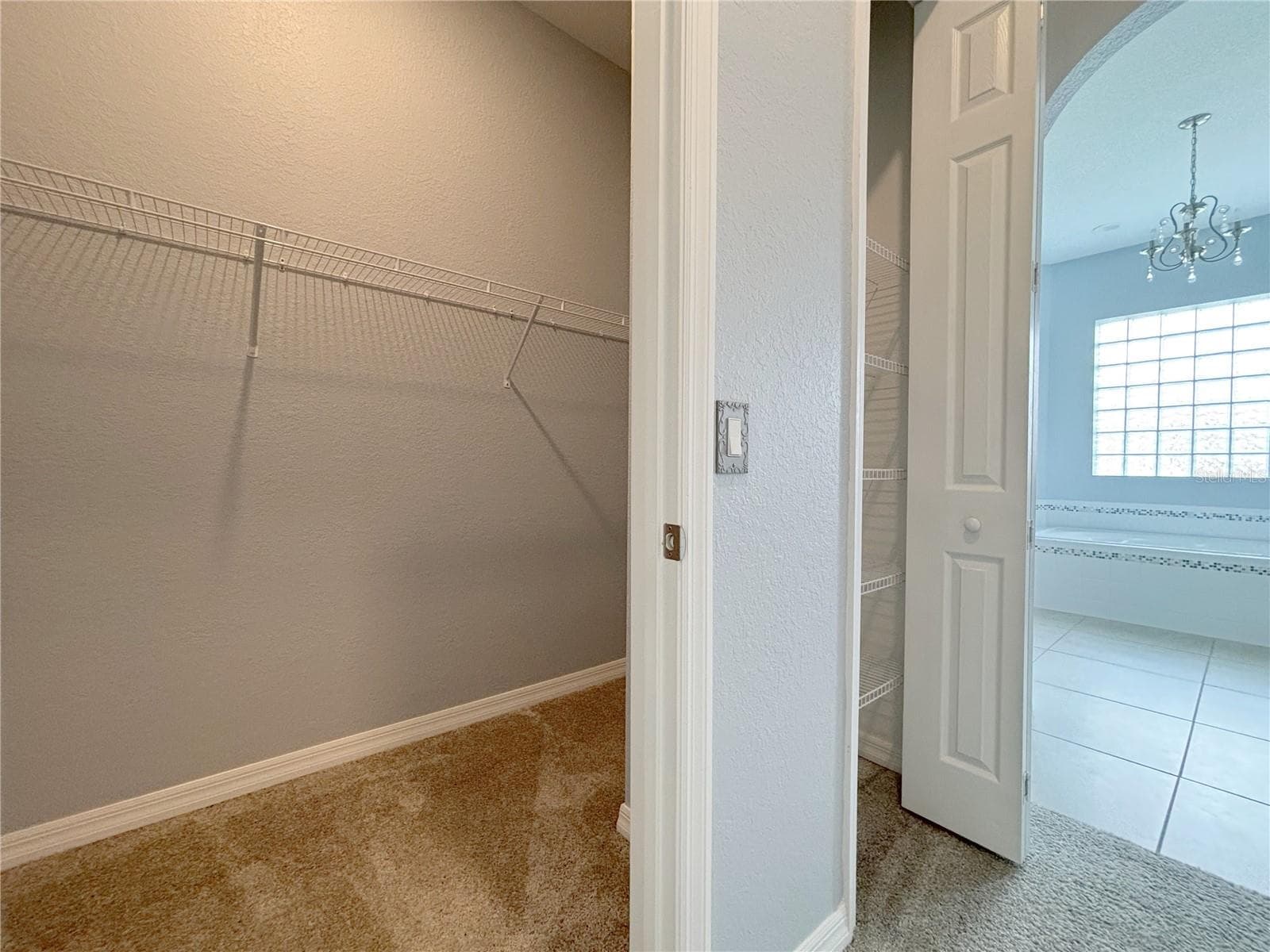 Linen Closet and Walk In Closet - 1124 SAWGRASS DR, WINTER HAVEN