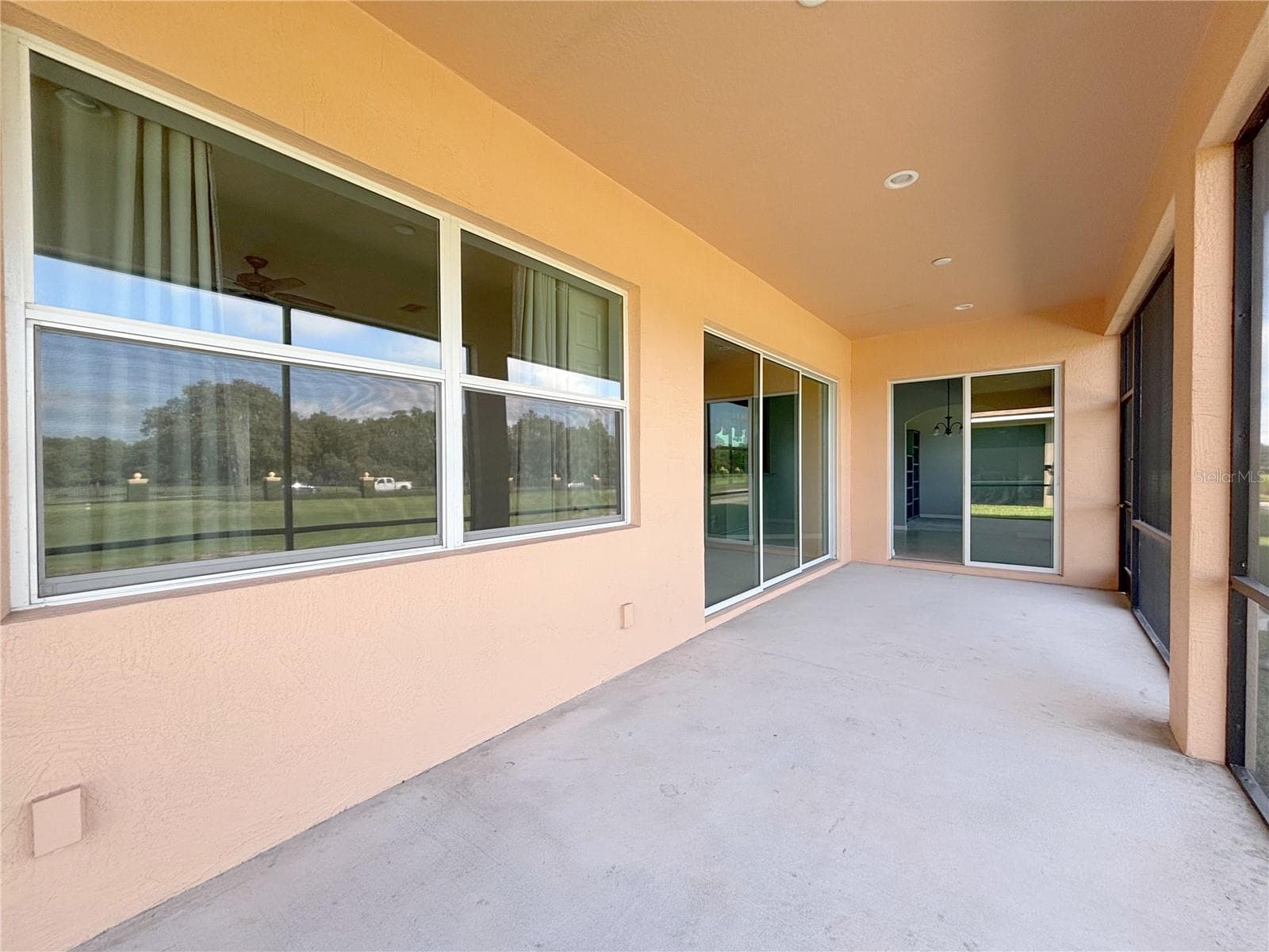 Covered and Screened Lanai - 1124 SAWGRASS DR, WINTER HAVEN