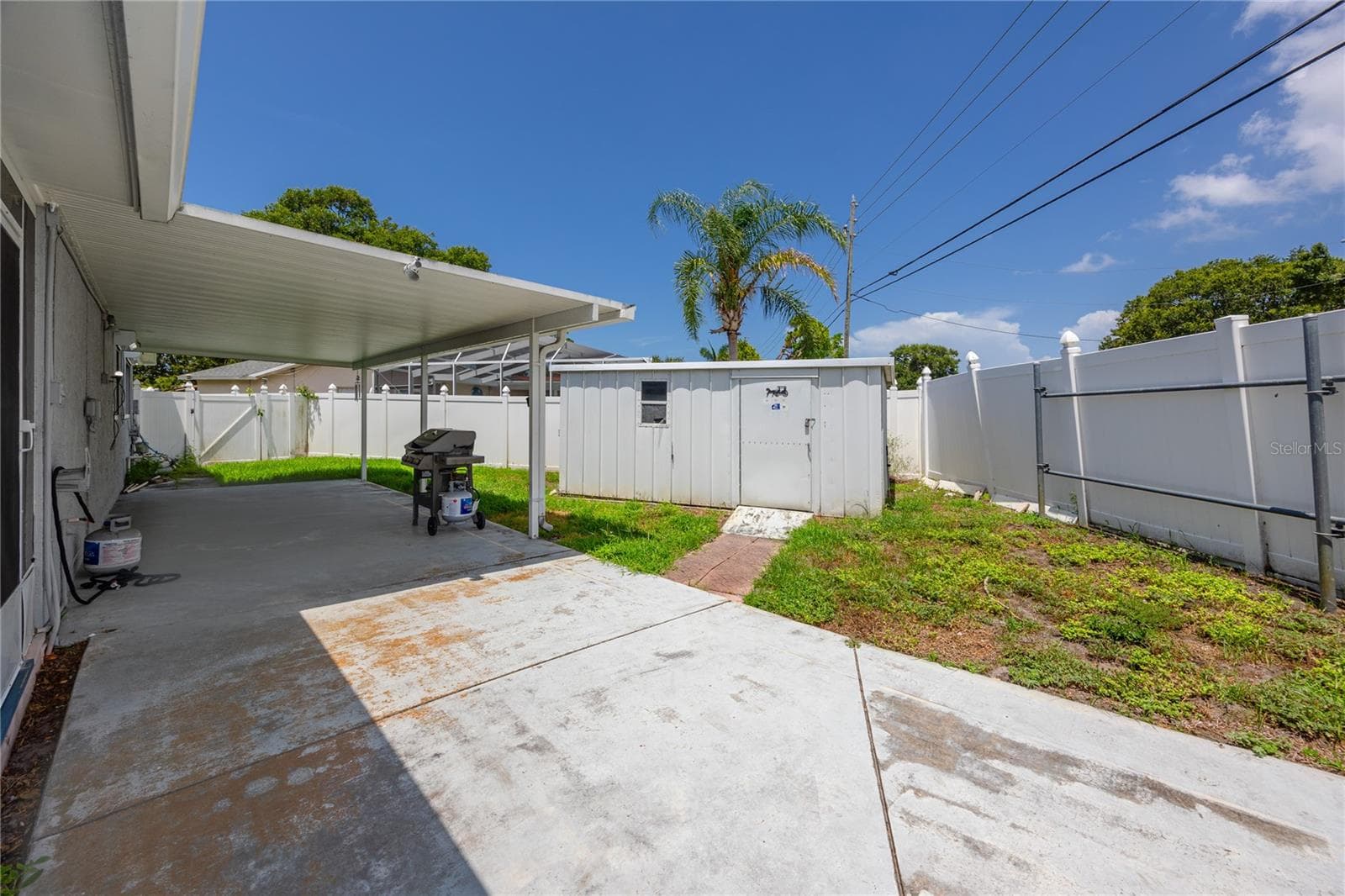 covered parking in backyard - 12291 MONARCH CIR, SEMINOLE