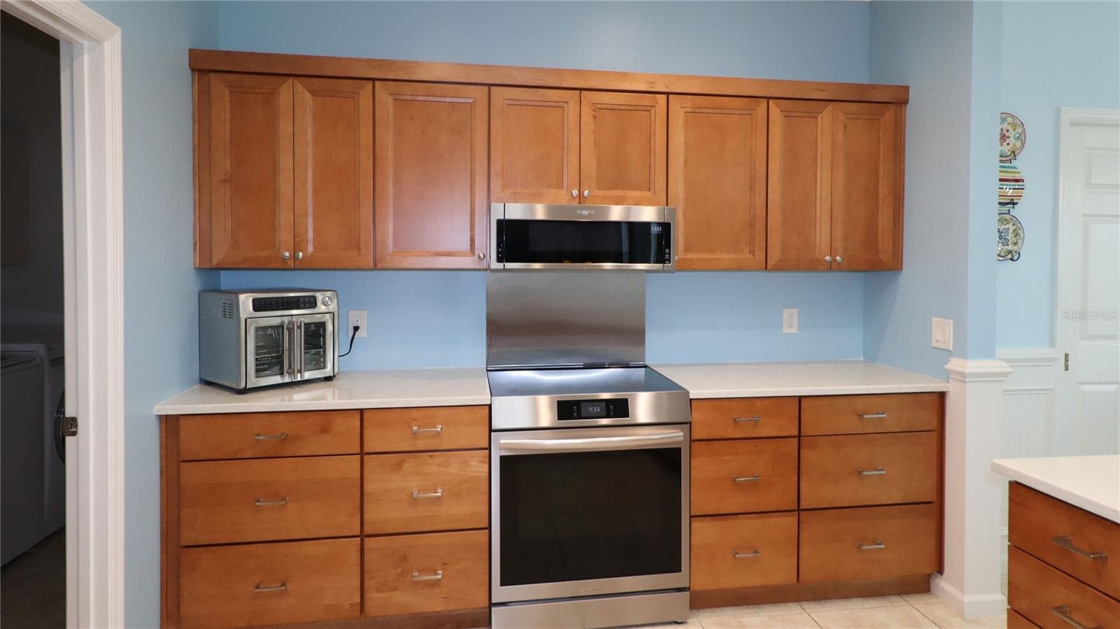 with abundant storage with pull outs... - 2293 NW 58TH TER, OCALA