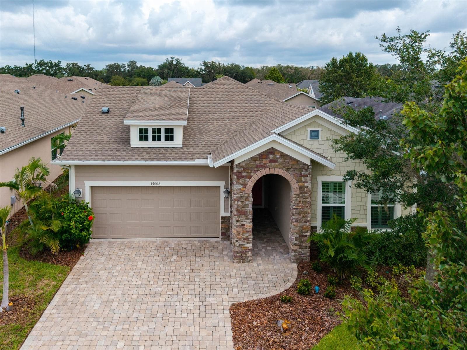 Beautiful Lorenzo Craftsman Elevation with Pavered Drive, Walkway & Covered Front Porch - 14008 SWALLOW HILL DR, LITHIA