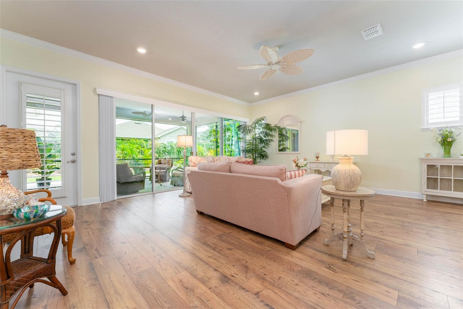 Spacious Great Room with Double Sliders Overlooking Lanai & Private Backyard - 14008 SWALLOW HILL DR, LITHIA