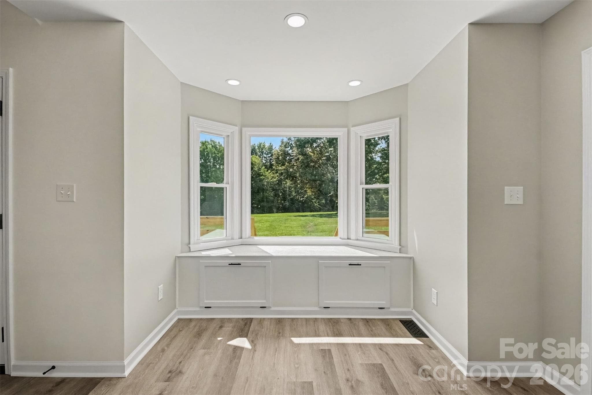 Breakfast nook with stunning view of backyad - 8379 Harvell Road, Stanfield