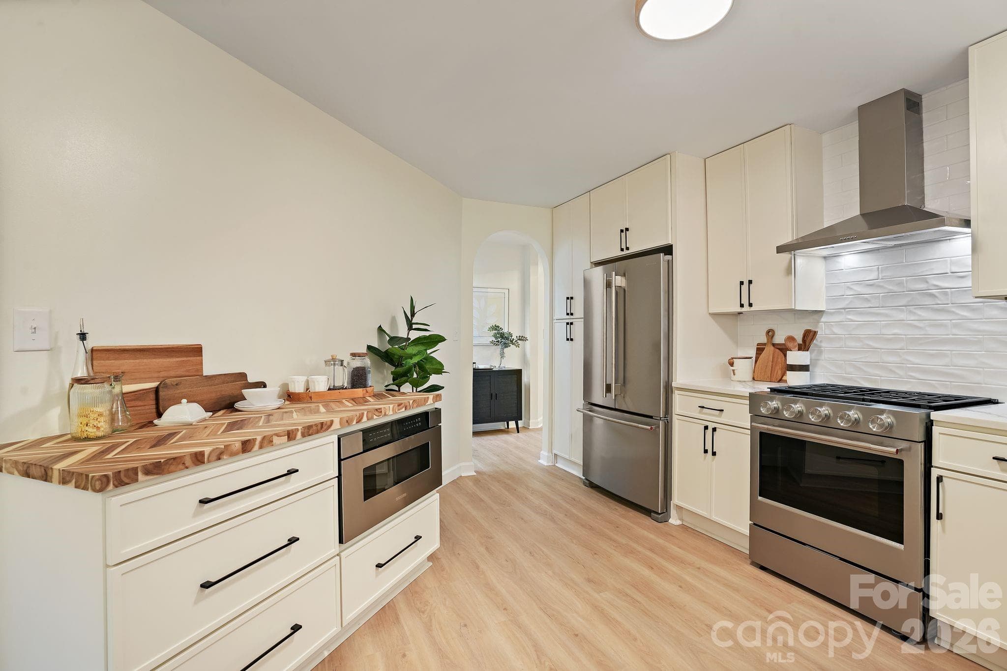 Modern Kitchen with Character Archway - 6301 Saddlebrook Court, Charlotte