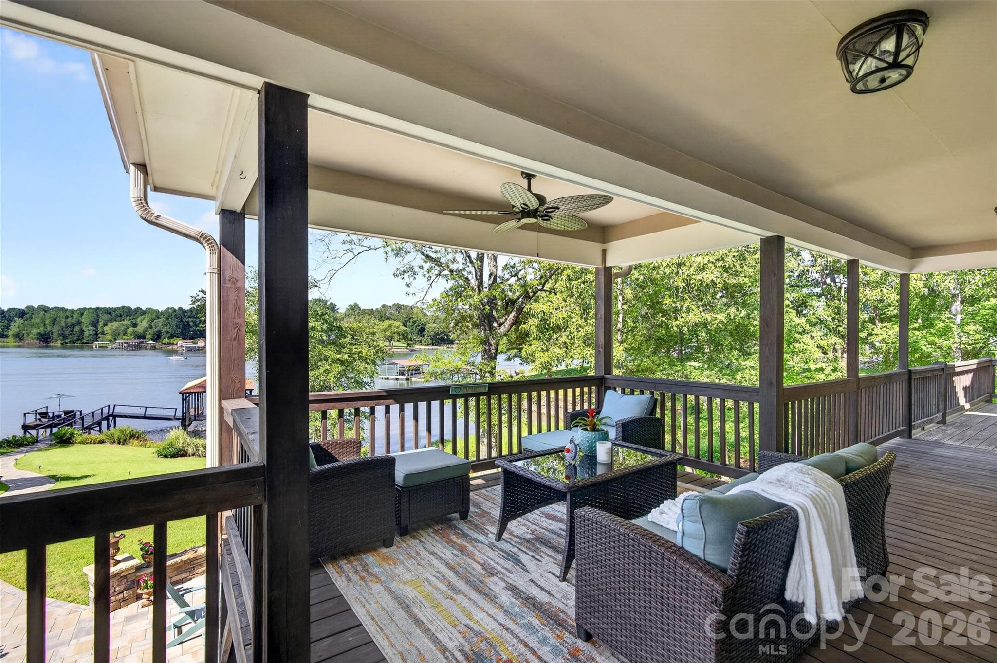 Back Porch overlooking patio and Lake Main Level - 7144 Lynbrook Creek Road, Denver