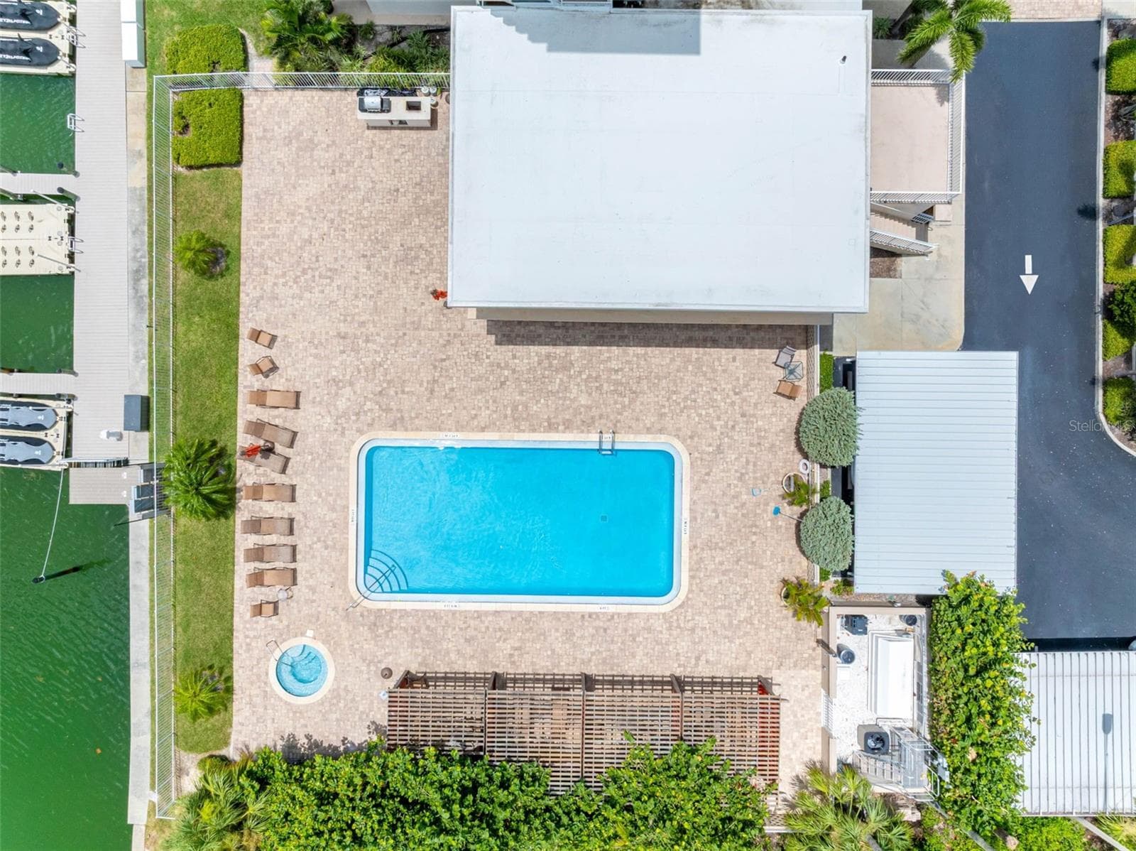 Clubhouse with covered pool patio below, BBQ, Heated Pool, Cabanas, Spa - 223 ISLAND WAY #7F, CLEARWATER BEACH