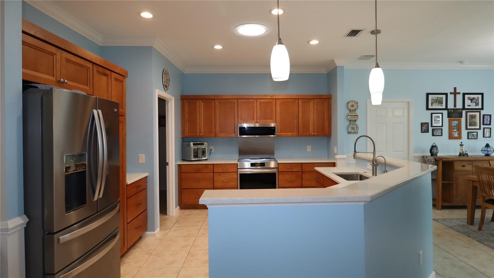 and excellent flow and lighting plus... - 2293 NW 58TH TER, OCALA