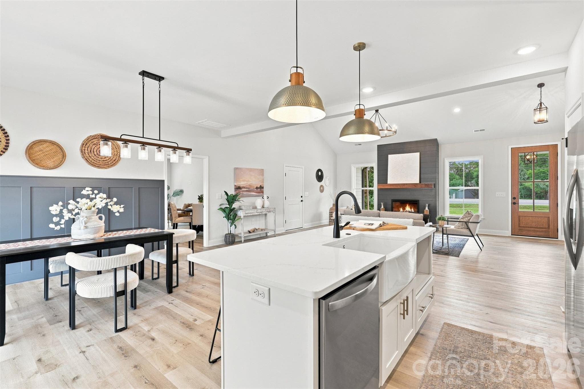 kitchen w/ thoughtfully updated cabinets & countertops, porcelain farmhouse sink, stainless steel hood vent - 390 NC 200 Highway S, Stanfield
