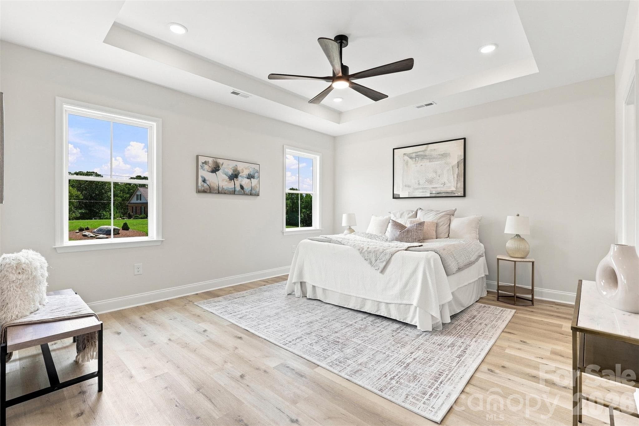 primary bedroom w/ tray ceiling, ensuite full bath, & WIC - 390 NC 200 Highway S, Stanfield
