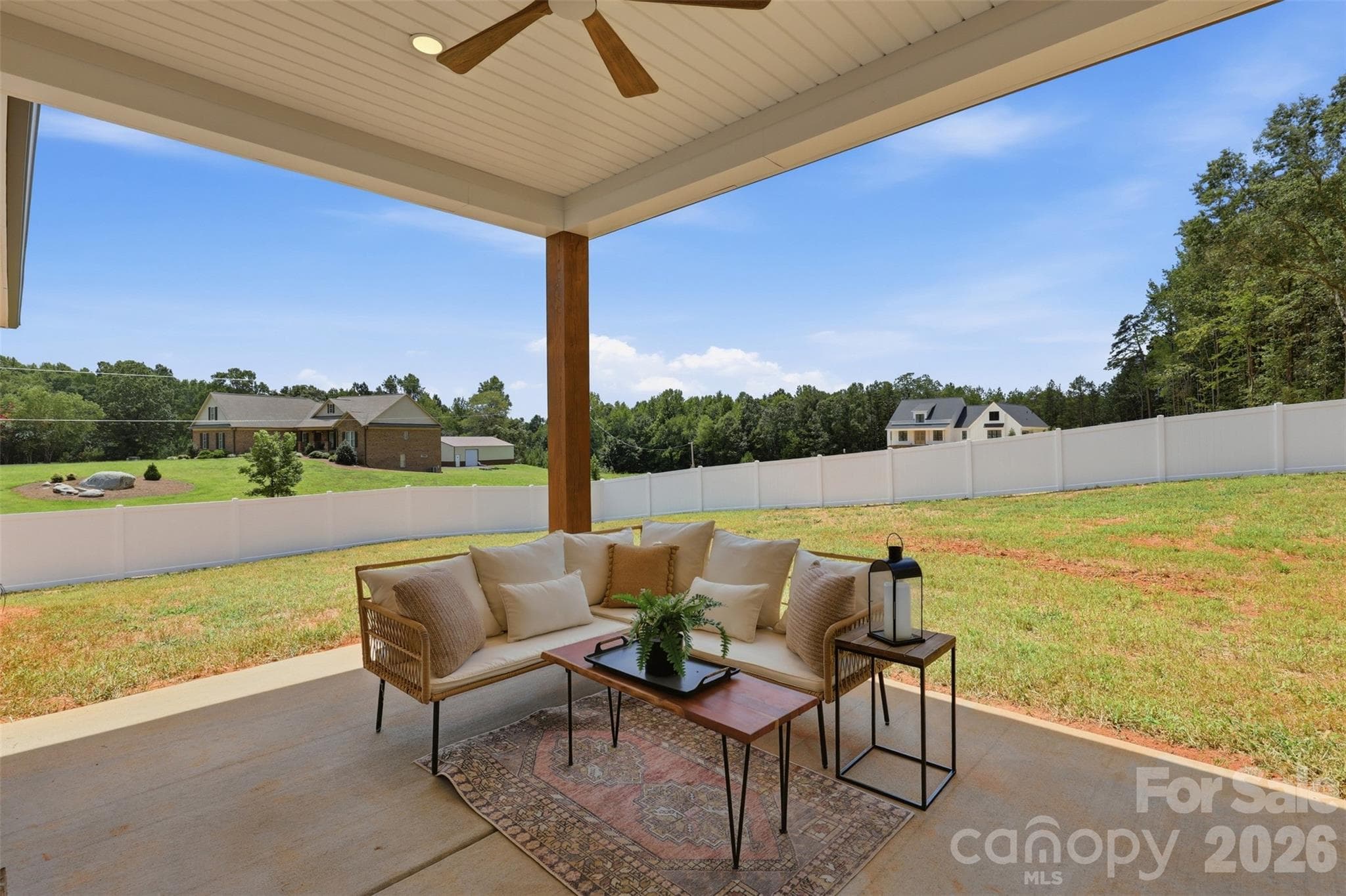 covered rear porch, privacy fence around backyard - 390 NC 200 Highway S, Stanfield