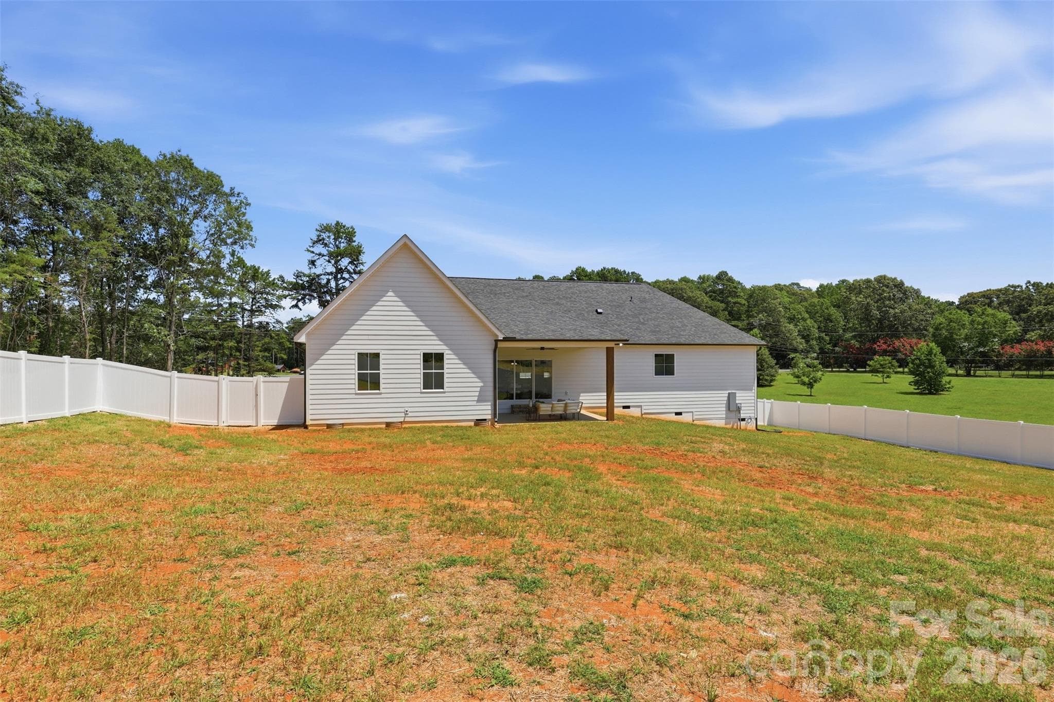 backyard w/ privacy fence - 390 NC 200 Highway S, Stanfield
