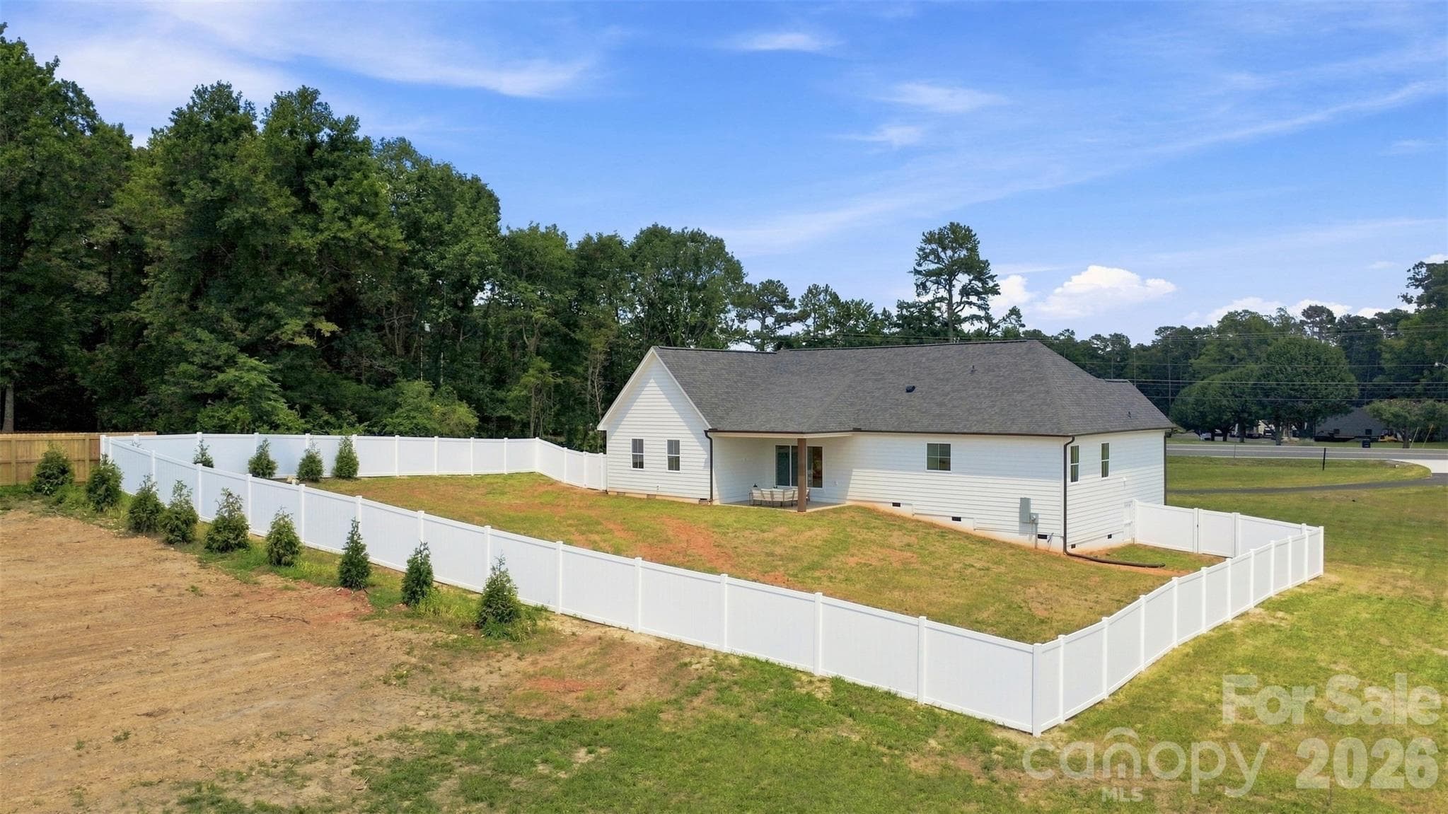 backyard w/ privacy fence - 390 NC 200 Highway S, Stanfield