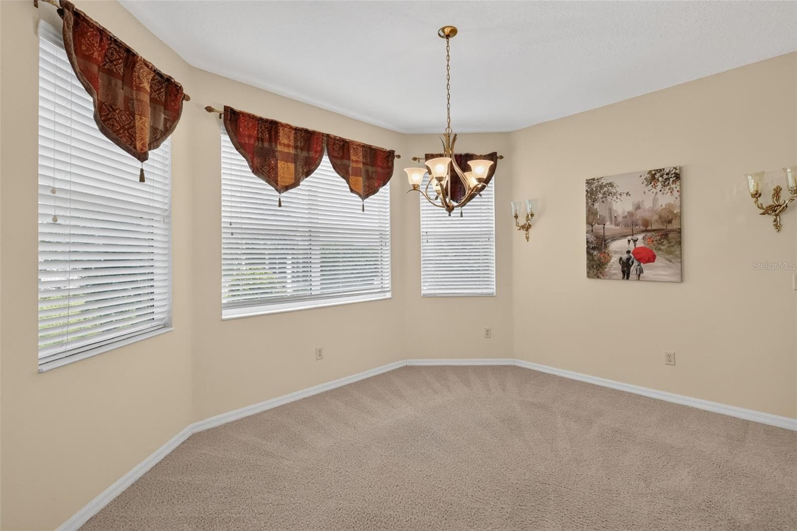 The dining area features a charming bay window - 2693 IRIS WAY, THE VILLAGES