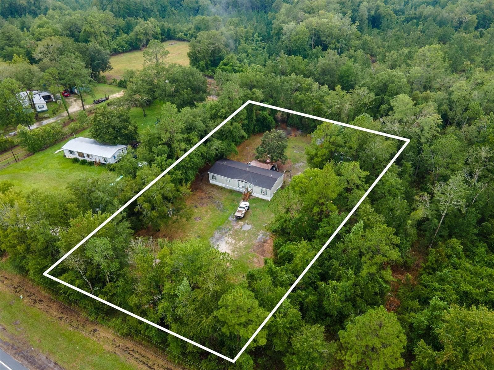 Manufactured Home at 9798 STATE ROAD 100 W, STARKE, photo 41 of 46