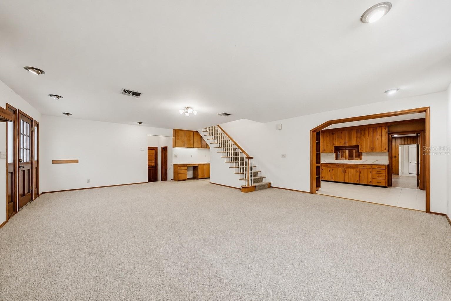 Main living room **Virtually Staged - 3123 W OAKLYN AVE, TAMPA