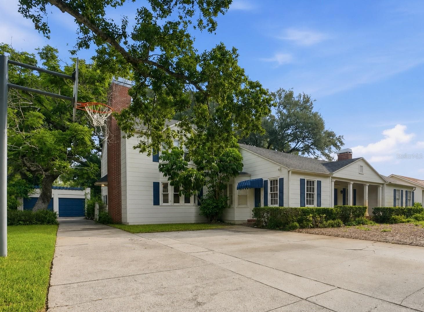 Garage detached to the back left of the home, Side entrance into the office - 3123 W OAKLYN AVE, TAMPA