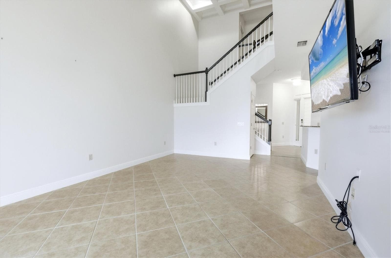 Image on tv virtually staged - 8434 MIRAMAR WAY, LAKEWOOD RANCH