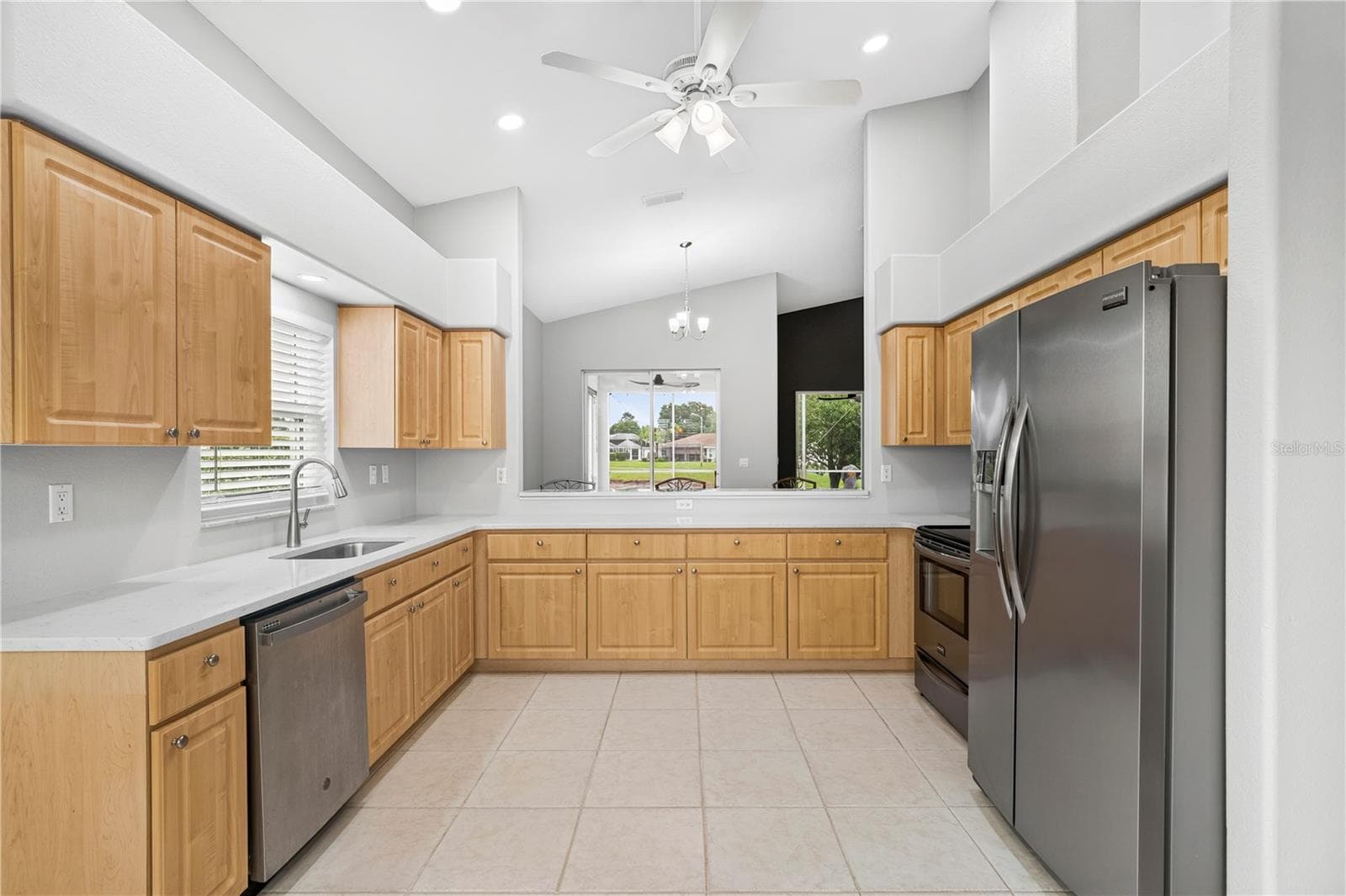 KITCHEN/ STAINLESS STEEL APPLIANCES/ QUARTZ COUNTERS - 9257 BONNIE COVE DR, WEEKI WACHEE