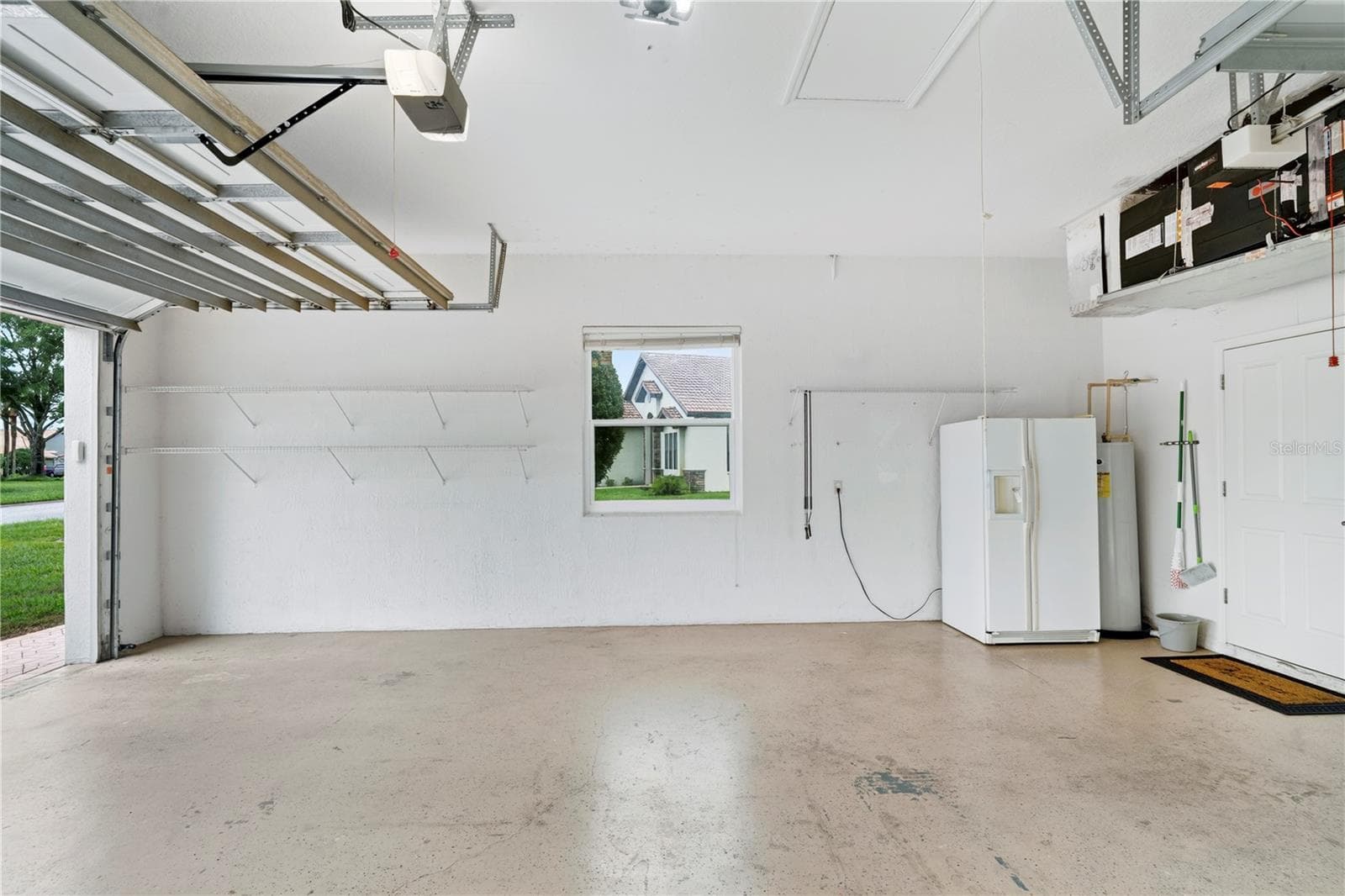 2.5 garage - 9257 BONNIE COVE DR, WEEKI WACHEE